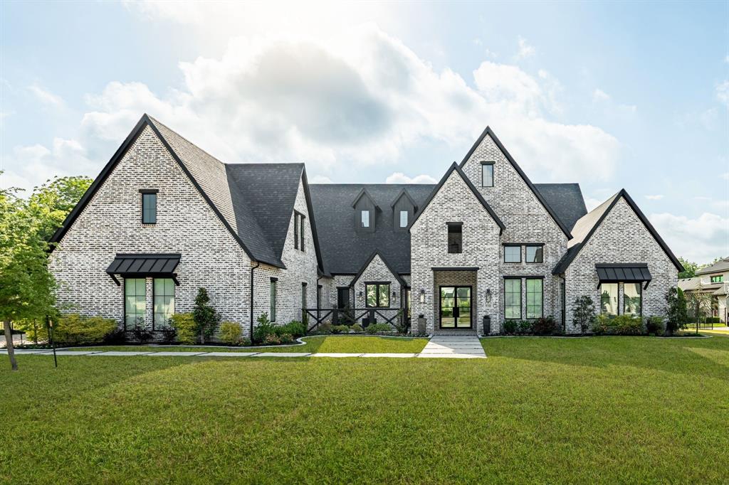 A slice of Heaven! This stunning custom J. Anthony home sits on ONE ACRE with a gorgeous pool & spa on a quiet cul-de-sac, and truly shows like new. A welcoming front porch and private courtyard set the tone. The fantastic one-story layout includes stairs leading to 1,250 sq ft of unfinished attic space - easily finishable for additional living area and instant equity potential of $200k+. Inside, the open, bright design features hardwood flooring, modern neutral tones, high ceilings, and thoughtful custom touches throughout. The chefs kitchen impresses with Monte Blanc quartzite, a large island with seating, 6-burner gas cooktop, built-in refrigerator, and a separate prep kitchen with quartz counters tucked conveniently behind a doorway. The spacious living room is the heart of the home, showcasing a floor-to-ceiling fireplace and a wall of windows overlooking the backyard oasis. The luxurious owners retreat offers dual vanities with leathered granite, a soaking tub, double shower, and a custom closet. Four secondary bedrooms each include their own ensuite bath and walk-in closet. The dedicated office features a speakeasy bookcase door leading to a bonus flex room, and the home also includes a large game room and media room. An oversized utility room, and mudroom area sit just off the 4-car garage. Step outside to your dream backyard: an oversized covered patio with brick fireplace and built-in grill area, plus a sparkling pool with spa, tanning ledge, and waterfalls. The expansive yard is fully enclosed with wrought-iron fencing and lush landscaping. Enjoy a convenient golf-cart path to nearby schools. Exemplary Lovejoy ISD with quick access to highways, shopping, and dining.