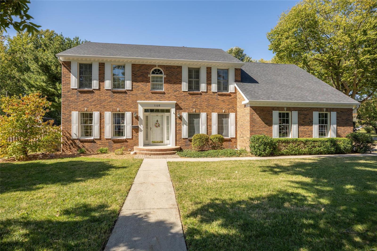 FAMILY TIES will be created in this stately all-brick home that boasts 4 bedrooms and 2.5 baths where every living space has been thoughtfully designed. The main level offers a living room, formal dining room, office, half bath, updated kitchen, and cozy family room complete with fireplace. Four spacious bedrooms and 2.5 baths, this home offers plenty of space for everyone to spread out while still feeling cozy and connected. The home exudes a sense of durability and timelessness, making it a perfect place to build lasting memories. The fenced-in backyard is a haven for outdoor fun, with a beautifully landscaped patio that’s ideal for family barbecues and relaxing evenings. Included with the property are two additional lots—one vacant, offering endless opportunities for play or expansion, and an adjoining lot with a large metal outbuilding, perfect for storing bikes, tools, or creating a family workshop. This is more than a house—it’s a true family home where comfort meets quality.