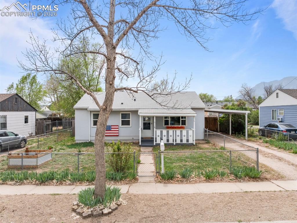 This dreamy little bungalow will steal your heart!  Despite a smaller footprint, this home feels like it is more than enough, not to mention, this is true, main-level living!  Updates in this remarkable rancher include a remodeled kitchen with high-end cabinets, granite counters, glass subway tile backsplash, pretty stainless appliances and an adorable breakfast nook with trendy shelving! Three bedrooms, plus a full bath with a linen closet, granite vanity top, travertine tile floor and tub surround!  Laundry room with shelves/pantry storage!  The spacious sun room adds more usable square footage and has so many uses...gym, project space, play room, etc.!  Plenty of outdoor living spaces to enjoy also, including turf rear lawn and a fully-fenced yard for pets and privacy!  The covered front porch is rocking chair-ready and is perfectly positioned for you to enjoy the gorgeous irises and roses that are getting ready to bloom in the front yard!  There is a raised garden bed for your summer planting, plus, a concrete patio in the back ready for your gas fire pit!   The quality-constructed shed includes a window, electricity and workshop space!  Plenty of off-street parking plus a carport!  Located close to shopping, dining, schools, entertainment and event centers like the Broadmoor World Arena, this up-and-coming neighborhood is the ideal place to start!
