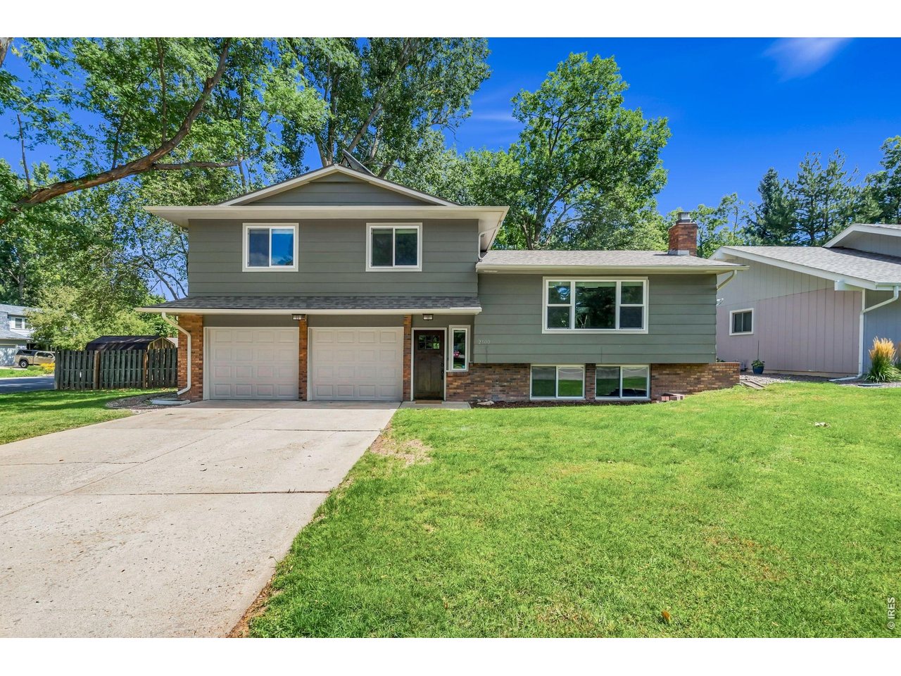 Welcome home to this beautifully updated property in the desirable Parkwood neighborhood, where thoughtful upgrades, exceptional amenities, and a prime central Fort Collins location come together. The fully remodeled kitchen is the heart of the home, featuring granite countertops, a massive island, soft-close hardwood cabinetry, stainless steel appliances, recessed lighting, and engineered hardwood flooring that flows throughout the main living spaces. Vaulted ceilings, skylights, updated vinyl windows, and top-down/bottom-up window shades fill the home with abundant natural light while providing comfort and privacy. The fully renovated bathrooms offer timeless finishes, including a spacious primary suite with dual vanities. A cozy gas fireplace creates the perfect gathering space, while the high-efficiency furnace and air conditioning provide year-round comfort. Additional upgrades include updated garage doors and an insulated garage complete with heating and cooling. Outside, enjoy a large, fully fenced backyard on a corner lot with mature landscaping, lush shade trees, an apple tree, and a storage shed. This home also features solar thermal panels to help reduce hot water costs. Residents enjoy access to Parkwood's outstanding amenities, including the neighborhood pool, tennis courts, clubhouse, and green spaces. All of this is conveniently located near shopping, restaurants, parks, and everything central Fort Collins has to offer.This move-in-ready home combines quality updates, energy-efficient features, and an unbeatable location-don't miss your opportunity to make it yours!