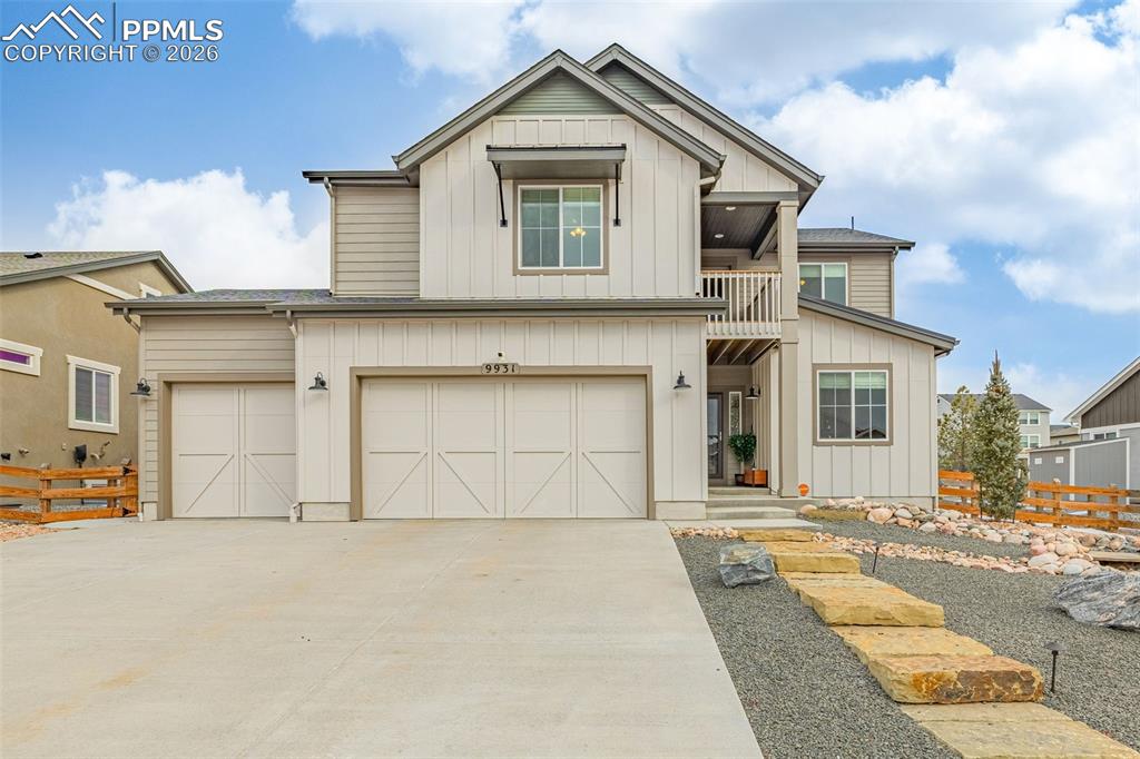 Beautiful modern farmhouse in The Retreat at TimberRidge, a premier Black Forest community known for spacious lots and newer homes. Situated on a 15,200 sq ft lot, this home is just a few years old and truly better than new, offering significant upgrades already complete—including window coverings, fencing, appliances, and an impressive  landscaping package. Outdoor features include a tranquil front water feature, concrete fire pit, covered rear patio with extendable awning and privacy shade, elegant concrete edging, and an extended sidewalk for seamless outdoor living.Offering over 3,800 sq ft, this home features 4 bedrooms, 4 bathrooms, and an oversized nearly 800 sq ft 3-car garage. Inside, rich hardwood floors and refined finishes welcome you, with a flexible formal living room near the entry. The open-concept great room flows into a gourmet kitchen showcasing an oversized quartz island, gas range with vent hood, soft-close maple cabinetry, subway tile backsplash, deep single-basin sink, and a butler’s pantry with beverage fridge and second dishwasher.Upstairs features a loft with access to an upper-level deck offering unobstructed Pikes Peak views, a spacious primary suite with walk-in closet and five-piece bath, two additional bedrooms with walk-in closets, a full bath, and upper-level laundry. The finished basement adds a large rec room with wet bar, bedroom, full bath, and storage. Additional upgrades include A/C, radon mitigation, whole-house water purification, and smart-home technology.