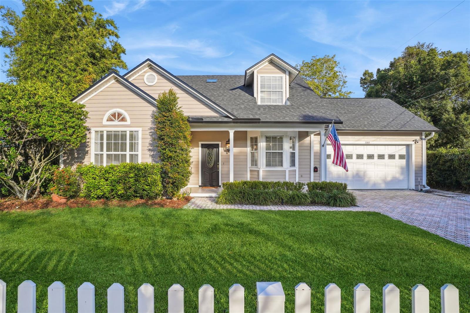 Under contract-accepting backup offers. Hard-to-find Pool Home in 32804: College Park character with modern convenience and resort-style outdoor living. This buyer ready home pairs a 2022 roof, real wood floors, and a classic white picket fence with everyday ease — primary bedroom and full bath on the main level, laundry, and an inviting great room. The kitchen serves both form and function with a cheerful breakfast nook, a breakfast bar, and a lovely dining room nearby.  Upstairs adds two bedrooms, a full bath, and a flexible loft for office, media, fitness, or play. Outdoor living shines with a rare screened pool and a huge screened back patio zoned for lounging and dining, all within a fully fenced, shade-cooled yard for play, firepit, dogs, privacy, etc. Pool fence for any need to separate the pool from patio. This home is an entertainer's delight.   A two-car garage, paver driveway, welcoming front porch, and mailbox at the house check all the convenience boxes. Publix is a few blocks away, and Edgewater’s dining, shops, and entertainment are around the corner. Let the charm of this environment take you through the heart of one of the most desirable neighborhoods in all of Orlando with great access to public transportation.  There are 3 parks and several lakes within blocks and a playground at Dartmouth Park.  Minutes to I-4, the AdventHealth SunRail Station (public train system), and the Packing District’s YMCA, 4Roots Farm Campus, and Great Southern Box Company Food Hall.  Opportunities like this are scarce — grab it fast.  Please CLICK ON TOUR LINK FOR A COMPREHENSIVE VIDEO WALK THROUGH TOUR.  Buyer must verify all information that is important to them.  Buyers are responsible for their own due diligence, including but not limited to verifying community information, leasing requirements, pet restrictions, schools, square footage, room dimensions, municipalities, taxes, etc.