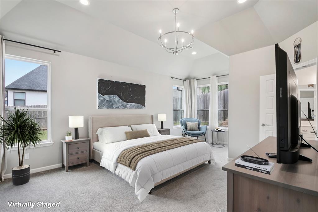 5.375 assumable loan. This can be assumed by anybody that can qualify for a loan. And meet the loan standards. This immaculate home offers an open-concept layout that flows seamlessly through the great room, kitchen, and breakfast area, highlighted by beautiful blonde hardwood floors. The chef’s kitchen showcases granite countertops, a grand center island, built-in stainless steel appliances, and a spacious walk-in pantry. A formal dining room with a soaring cathedral ceiling creates an elegant setting for gatherings. Enter through the garage to find a thoughtfully designed mudroom with a built-in drop zone featuring storage cubes, bench seating, and hooks for easy organization. The private primary suite boasts 11-foot ceilings, a versatile sitting or work area, and a spa-like bath with double vanities, soaking tub, and a glass-enclosed shower with bench. The expansive walk-in closet connects directly to the laundry room for everyday convenience. Downstairs, you’ll find three generously sized bedrooms and two full baths. Upstairs offers a large open bonus area, an additional bedroom, and a full bath—perfect for guests or a home office. Storage abounds, including under-stair space. The 3-car garage features lifetime epoxy flooring. Neighborhood amenities include a pool, playground, and gated entry, offering both comfort and community.