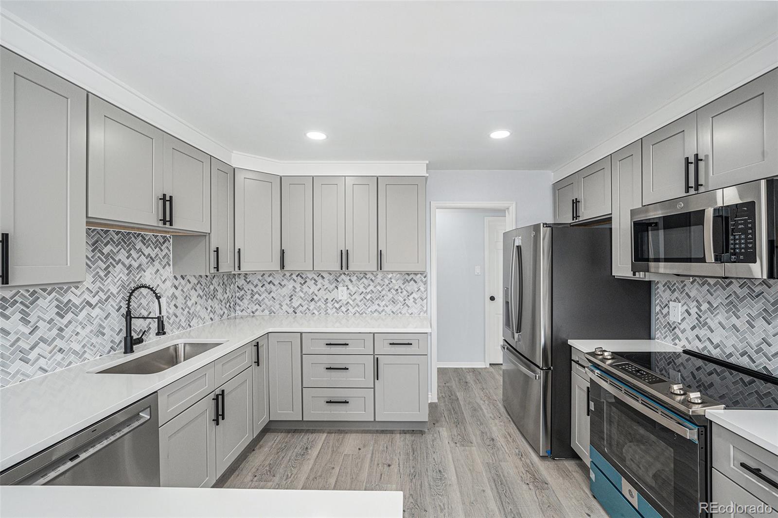 Beautifully Remodeled 2-Bed, 2-Bath Condo with Natural Light & Modern Finishes!
This bright, updated condo features an open floor plan with brand new carpet in the bedrooms and sleek laminate flooring in the main living areas. The spacious living/dining area is perfect for entertaining, and the modern kitchen includes stainless steel appliances plus a full laundry room with washer/dryer. Enjoy low-maintenance living with a nearby pool and BBQ space. Includes 2 reserved parking spots (1 garage, 1 surface) and extra secured storage space right across the unit. Prime location—minutes to I-25, Light Rail, shopping, dining, DTC, and Cherry Creek.

Don’t miss this move-in-ready gem—schedule your showing today!