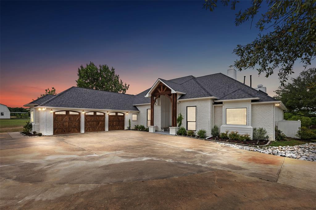 Positioned on a hilltop to capture expansive sunset views, this remodeled (2020) modern farmhouse offers a unique blend of privacy, functionality, and long-term upside. Set on 6.8 acres in an unincorporated area outside city limits, the property benefits from an AG exemption and significantly lower tax exposure - an increasingly rare combination this close to major growth corridors.The land is thoughtfully improved with a private pond fed by an onsite well, mature trees, and usable acreage suited for a variety of residential or recreational uses. A gated entrance welcomes you to a picturesque setting complete with a windmill, separate office or flex space, raised garden beds, and dedicated areas for seasonal planting.Located within walking distance to West Grove development, this property sits directly in the path of continued expansion along 380, creating a compelling opportunity for both end users and those considering future positioning.A hard-to-find combination of location, land, and flexibility—this is one you don’t see often.