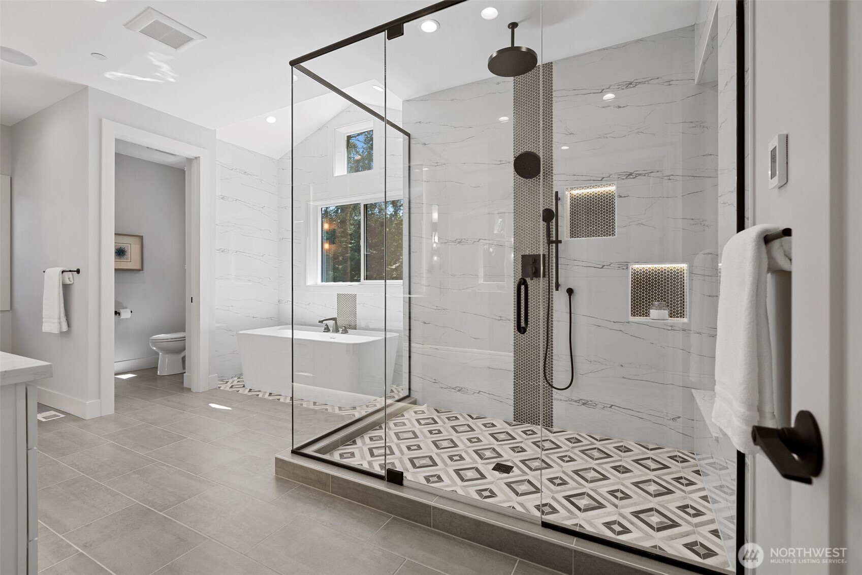 Spa like Luxe 5 piece bathroom to relax after a long day of activities.