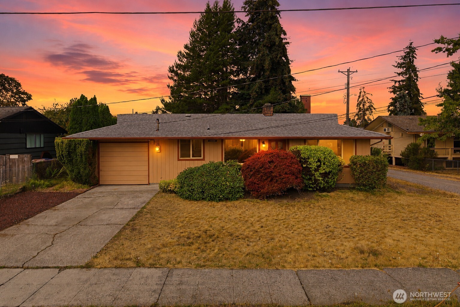 Welcome to this inviting North Tacoma rambler, ideally situated in the desirable 98407 area! This 3-bedroom, 1.5-bath home offers 1,252 sq ft of comfortable single-level living with a functional layout designed for everyday life. The spacious living room features a cozy fireplace, creating a natural gathering space, while the kitchen and dining areas provide plenty of room for everyday living and entertaining. Three well-sized bedrooms offer flexibility for guests, a home office, or growing needs. Step outside to the fully fenced backyard, offering a private space to relax, garden, entertain, or enjoy the outdoors. An attached garage provides convenient parking and storage. Located near Point Defiance and the many shops, restaurants, parks, and amenities North Tacoma has to offer, this home puts you close to some of the area's best attractions while maintaining a residential feel. Enjoy the ease of rambler living, a functional layout, and a private backyard in this sought-after North Tacoma location!