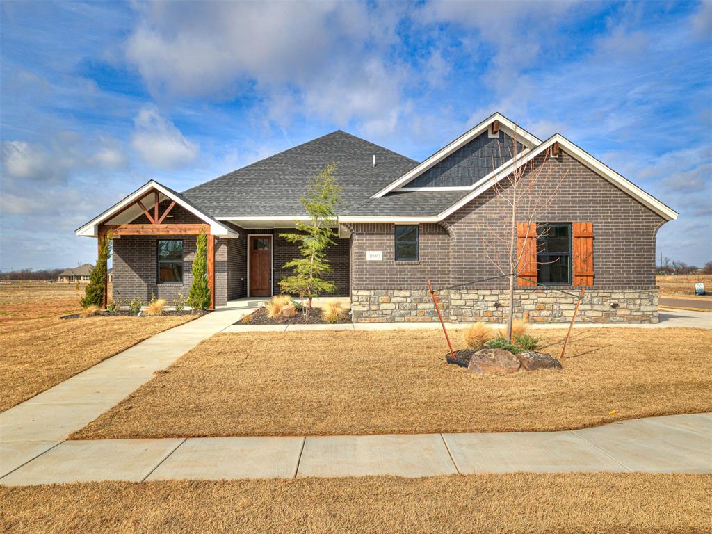 Beautiful home in up and coming neighborhood located in the Sanabria Addition, SW OKC, Moore school district,  The home has an above ground indoor built-in storm shelter, outdoor grill station with granite, brick, gas and electric, beautiful kitchen cabinets that soar to the ceiling, 2 living areas, study, 3 bedrooms, crown molding, bull nosed corners, quartz countertops, built-in spice pull out, built-in appliances, HERS energy efficient rating, 10 yr. RWC Warranty (structural), SMART home features, large center island with cabinets on both sides, full sprinkler system, beautiful wood look ceramic tile floors, ceiling fans in all bedrooms, linen closet, full wood privacy fence, 3 car side entry garage.   The bathroom has a tiled walk-in shower and a walk-in closet.  Enjoy the neighborhood clubhouse, pool, splash pad, pavilion and more!