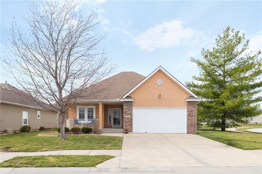 You've got to take a look at this one! Perhaps the best value in the Fountains right now!  Maintenance free living with access to Raintree Lake Amenities. Lawn care, irrigation, snow removal are all covered.  All you have to do is relax and enjoy two patio areas, a well maintained and clean home, a large downstairs family room with bar for entertaining and a 235-acre lake! Rent a pontoon, take swim in the pool, walk the trails, (more than 7 miles) meet your friends at one of the two Clubhouses! This home is four bedrooms and 3 bathrooms, plus a bonus room that could be a great office or studio.  This is a 55+ community!  Come enjoy life at The Fountains of Raintree!  You deserve it!