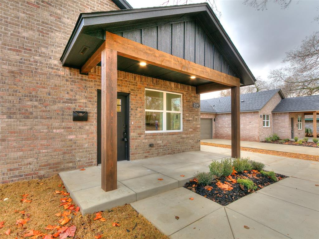 Welcome to this beautifully crafted new-construction home in the heart of the Northeast OKC! Thoughtfully designed with modern finishes and timeless details, this home offers exceptional style, efficiency, and convenience. It is located just minutes from Downtown OKC with quick highway access for effortless commuting.Step inside to an inviting open-concept layout featuring a bright, airy kitchen complete with a farmhouse sink, quartz countertops, herringbone backsplash, stainless steel appliances, and a spacious center island perfect for gatherings. Elegant pendant lighting and custom cabinetry elevate the space, while the wood-look flooring adds warmth and durability throughout.The luxurious primary suite offers a spa-inspired bathroom with a double vanity, LED-lit mirrors, beautiful marble-style tile, and a walk-in shower that creates the perfect retreat after a long day.Outside, the home showcases charming curb appeal with its brick exterior, covered porch, and fresh landscaping. With its modern design, quality craftsmanship, and prime location, this property is truly move-in ready.Do not miss your chance to own a brand-new home in the heart of White Orchid. Schedule your showing today!