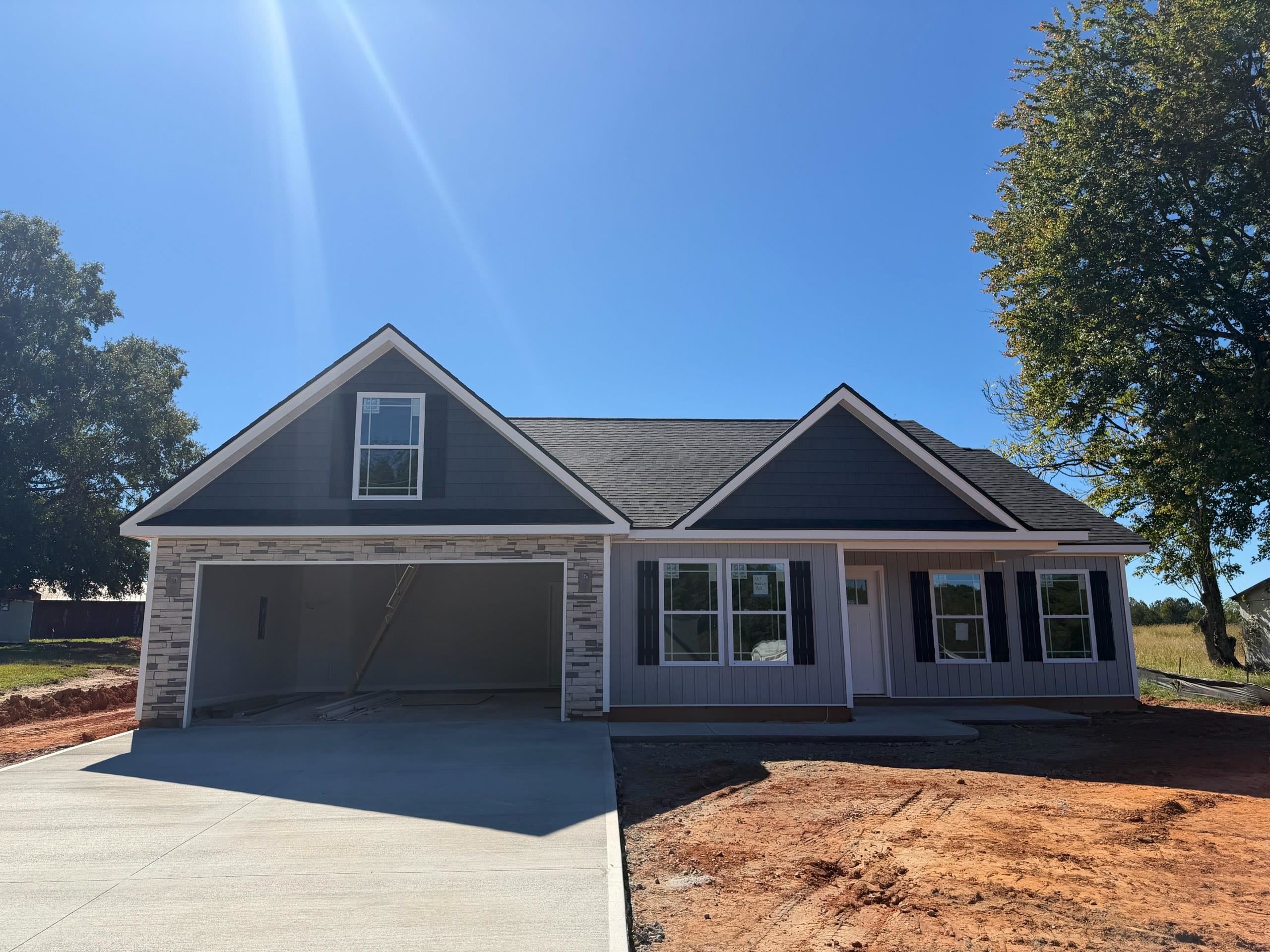 New Construction NO HOA! The Sage plan by Enchanted Homes. Great location in the Inman Campobello area, close to public parks and ball fields. Luxury Vinyl Plank, Granite countertops, Upgraded covered patio and uncovered adjacent. 10 year limited warranty included. Must see! *3d tour shows completed version of the same house plan.