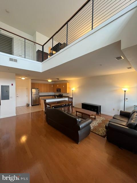 Spacious Furnished Loft-Style Condo in Village LoftsEnjoy urban living in this exceptionally spacious two-level condo at Village Lofts. Filled with natural light from large windows, this updated and fully furnished residence offers an open, airy feel throughout. The oversized one-bedroom layout features a generous walk-in closet and a large private bathroom, providing both comfort and convenience.Step outside to your private balcony, perfect for relaxing or enjoying the neighborhood atmosphere. The secure building offers controlled access and includes one assigned parking space in a secured garage.Ideally located within walking distance of restaurants, museums, and Johns Hopkins University, this condo combines modern amenities with easy access to some of the area's best dining, culture, and educational institutions.Highlights:Large two-level loft-style floor planFully furnished and updatedAbundant natural light throughoutPrivate balconyOversized bedroom with walk-in closetSpacious bathroomSecure building with controlled accessOne assigned parking space in secured garageWalkable location near restaurants, museums, and Johns Hopkins UniversityThis bright, move-in-ready condo offers the perfect blend of space, security, and convenience in a highly desirable location.