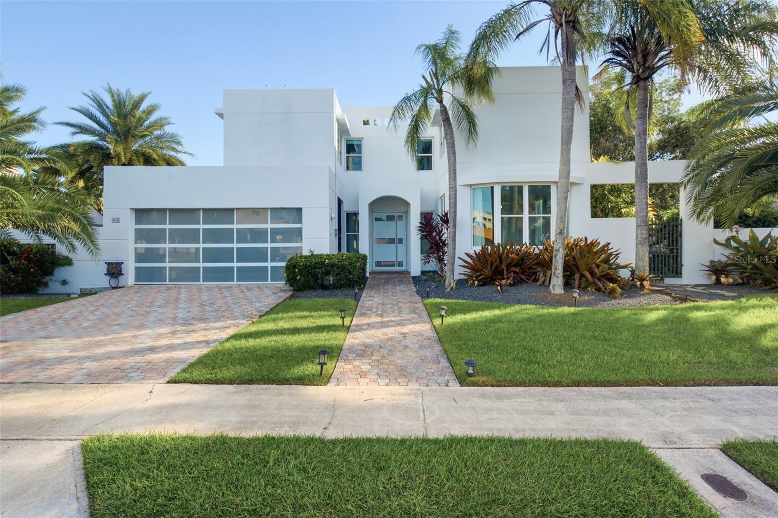 Private resort living in the heart of Dorado. Set within the gated community of Paseo del Mar, this extensively upgraded residence delivers a heated swimming pool, jacuzzi, cascading waterfall, outdoor kitchen, 52 solar panels, and two Tesla Powerwall batteries — bringing together an exceptional lifestyle and impressive energy infrastructure. The two-story home offers 4 bedrooms, 3.5 baths, a versatile bonus room, and 2,634 SF of interior living space, anchored by a newly remodeled kitchen featuring sleek cabinetry, stainless steel appliances, and a generous island. Open living and dining areas connect to an expanded glass-enclosed sitting room, where accordion doors open to a backyard that feels like a private resort. A sun deck, covered terraces, built-in BBQ, and lush landscaping create the perfect setting for entertaining or simply enjoying the outdoors. Upstairs, the primary suite features a walk-in closet and ensuite bath with double vanities, a jetted tub, and separate shower, while a dedicated media room provides additional space to unwind. A 500-gallon cistern, reverse osmosis system, updated A/C units, and two-car garage complete the offering. Designed for those who appreciate comfort, privacy, and effortless indoor-outdoor living, this residence captures the best of the Dorado lifestyle.