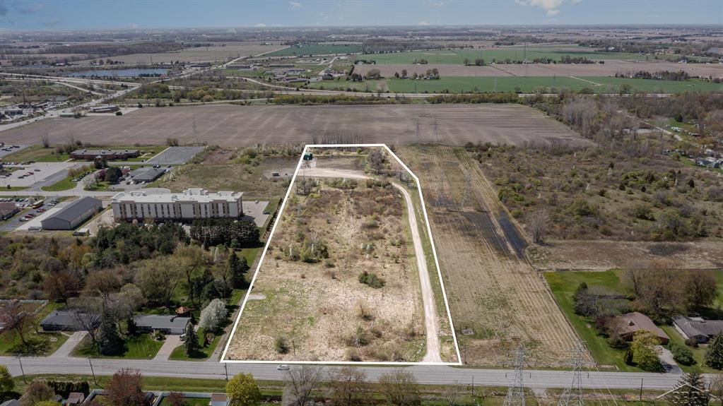 Prime development opportunity in Bay City, Michigan! This 9.74-acre parcel is strategically located near Menards on 2 Mile Road, offering excellent access to major transportation routes and a densely populated residential neighborhood. Perfectly suited for a modern storage facility, this site includes comprehensive environmental and development documentation.  Located in a growing corridor with nearby retail and residential development, this parcel is an outstanding opportunity for developers and investors seeking to meet the increasing demand for recreational and personal storage in Bay County.  Whether you're expanding your storage portfolio or entering a high-demand market, this site offers everything needed to get started immediately-with significant time and cost savings thanks to included due diligence and planning work.  Development-Ready Highlights:  Fully Engineered Site Plan: Designed for RV/boat storage and climate-controlled mini storage units  Environmental Reports Included:  Phase I Environmental Site Assessment  Phase II Environmental Site Assessment  Utilities Available: Water, sewer, electric, and gas available at the road or nearby  Level Topography: Ideal for immediate construction with minimal grading required  Zoning Permits Storage Use: Streamlined path to approvals and permits