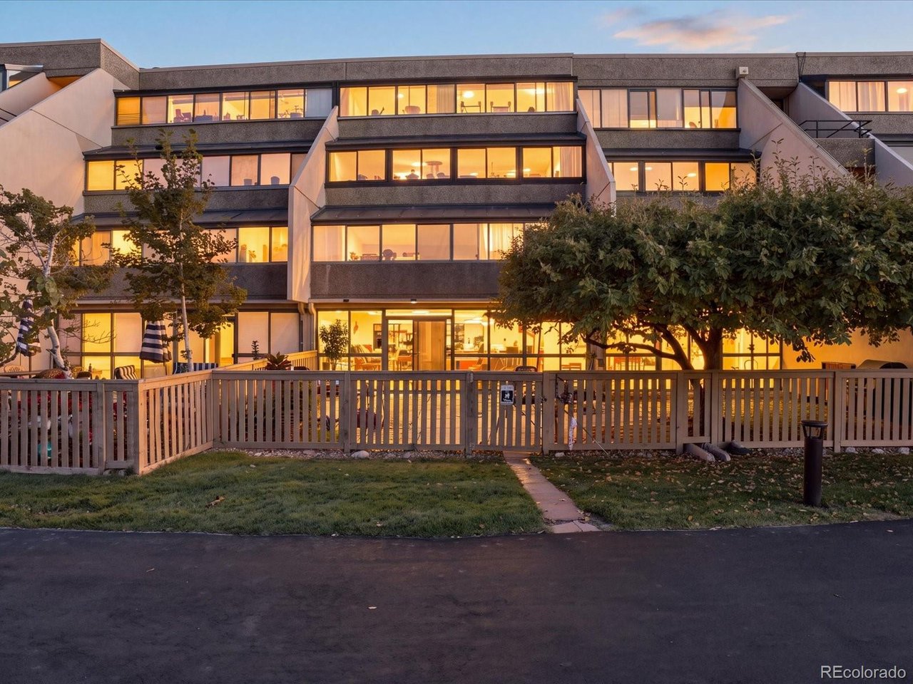 Rare Opportunity ground level condo in one of the DTC's best-kept secrets-this beautifully completely updated main pairs thoughtful attention to detail with an unexpectedly peaceful setting. Every space reflects the care put into creating a home that feels inviting, distinctive, and easy to enjoy.The custom-designed kitchen features unique granite countertops and an expansive island with generous seating. An open layout connects the kitchen, dining, and living areas, while coastal-inspired flooring brings a light, relaxed feel throughout. Designer bathroom finishes, carefully selected fixtures, and beautiful tilework add to the home's polished character.The primary bedroom offers a walk-in closet and adjoining lanai, while a separate sunroom off the main living space provides another place to unwind. Outdoors, the spacious patio opens through a gate toward the pond and rose garden, with more than seven acres of grounds and walking paths to explore. Gated and front door secured entryFrom the finishes inside to the beauty just beyond your patio, this condo offers a remarkable retreat in the DTC. You truly have to experience it in person to appreciate the details, craftsmanship, and care that make it so special! Move in ready, quick close.