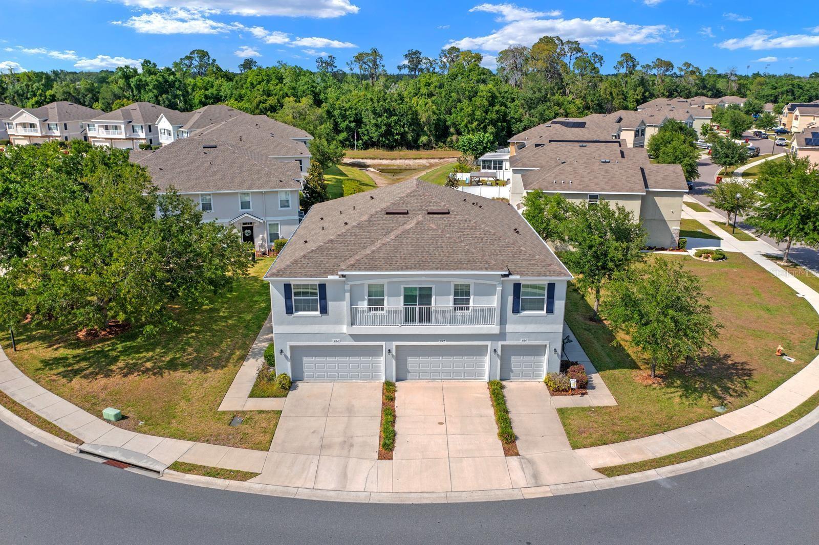 Wow! Looks like a model!  Immaculate and extremely well maintained! Move right into this spacious town home built in 2015 with 3 bedrooms, 2.5 baths, a 2 car garage, and inside utility!  New carpet on first floor and stairs.  Large open living/dining area, kitchen, half bath, and laundry on the first level.  Full guest bath, 2 bedrooms and the primary suite with private bathroom are on the second level.  New roof 2025.  Exterior stucco and paint 2025.  Newer water heater.  Low quarterly fees include water, sewer, trash, exterior maintenance, grounds maintenance, community pool, playground, basketball courts... Affordable living in Tampa Bay! About 30 minutes to Downtown Tampa and Downtown Lakeland.  About 1 hour to Bradenton and Downtown St. Pete. A little more than an hour to Orlando or the pristine sands of the Pinellas Gulf Beaches... Buyer to verify all community rules and information with association.  Measurements are approximate and should be verified.