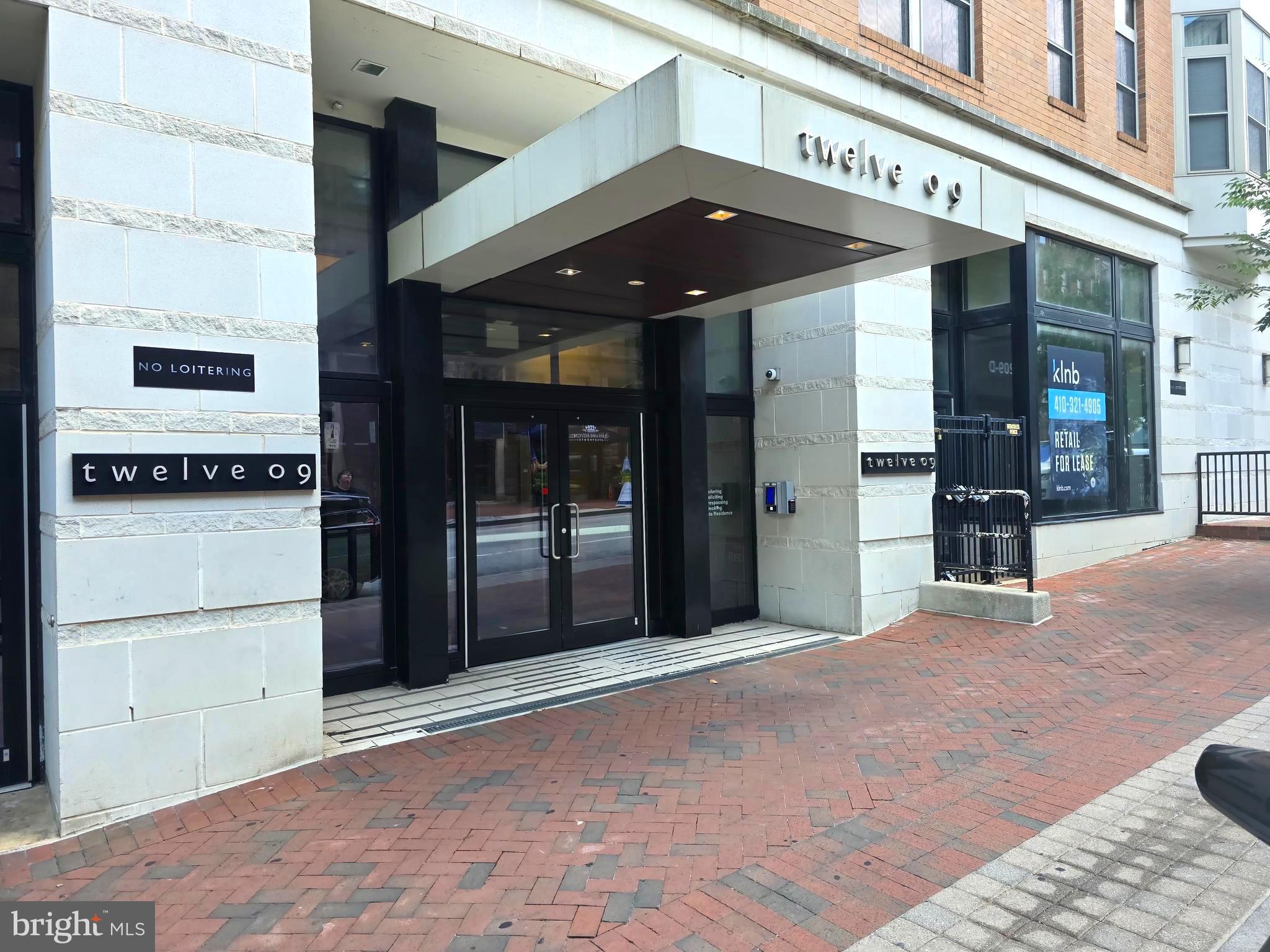 OPEN HOUSE, this Friday, July 31st from 6:00pm to 7:30pm!!**Rent includes gas, and water as well as trash removal.****Two available parking spaces in a secure parking garage, offering added convenience and peace of mind.****Unit can be rented fully or partially furnished at no additional cost if desired!**Beautiful contemporary and completely renovated 2 bedroom, 2 bathroom unit with a den located in the highly desirable Mount Vernon  / Station North neighborhood. Modern luxury living in close proximity to MICA, Johns Hopkins University and UB Law.Ideally located near a wide variety of local dining, shopping, and entertainment options, with easy access to major commuter routes, this property offers both convenience and a vibrant city lifestyle. Penn Station offers access to NYC and DC for commuting or weekend getaways! This is the lifestyle you deserve.This remodeled and fully furnished home offers a comfortable and functional layout, featuring a combination of hardwood, carpet, and tile flooring throughout to suit both style and practicality. The unit boasts an inviting living area, along with an additional entertainment room that can be used as a media space, home office, or lounge area, perfect for relaxing or hosting guests. The kitchen is fully equipped with modern appliances, including a gas stove, refrigerator, built in microwave, and dishwasher, providing both convenience and efficiency for everyday living.Enjoy the added benefit of an in unit washer and dryer, as well as central AC to ensure comfort year round.The building includes a gym, as well as a private courtyard featuring a fountain and outdoor stone patio, offering excellent shared amenities for residents to enjoy.Pets are considered on a case by case basis.
