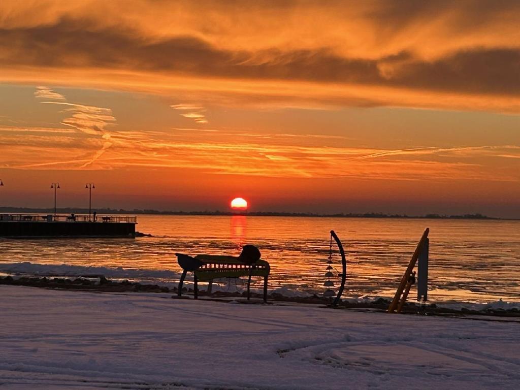 So you want to be on Tawas Bay? This custom-designed 3 bedroom, 4 bath, 2300 sq ft home offers timeless elegance with modern comfort, all with a breath taking view of Tawas Bay. In addition to its Great Room, with a panoramic view of the bay, it features 3 spacious Bedrooms each with its own ensuite Bathroom. The Kitchen features modern appliances and Quartz counter tops. Large L shaped island for entertaining/feeding your friends. Radiant in-floor heating will keep you cozy during the up north winters. You'll want to spend the warm summer days on the beach enjoying the awsome beauty of the Tawas Bay waters. Boating, swimming, fishing, it's all right here. Within walking distance of the City Park, dining, and shopping. Additional garage to store all your toys, with overflow sleeping are on the second floor. Ya gotta see it!