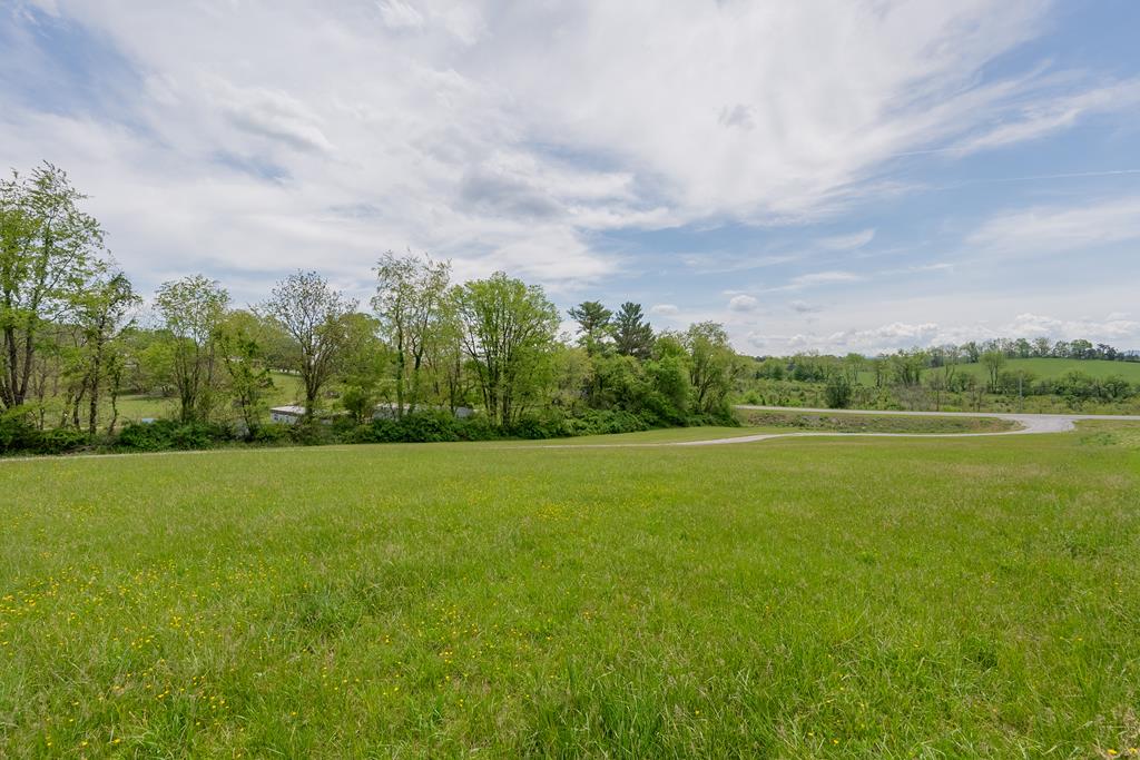 Looking for the perfect spot to place your manufactured home or build your dream home? Here is your chance at a .90 acre tract conveniently located near I-81& I-77. Public water available. Restrictions are on file. These lots are a hard find and will be gone soon! Call today.