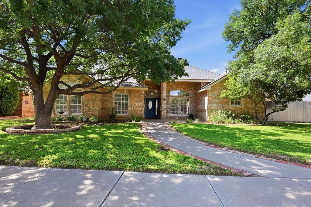 WOW! BEAUTIFULLY UPDATED 4 BEDROOM, 3.5 BATH 2 LIVING ROOM HOME IN DESIRABLE GRASSLAND ESTATES WITH A RESORT-STYLE POOL! THOUGHTFULLY DESIGNED FLOOR PLAN FEATURING A SEQUESTERED PRIMARY SUITE WITH AN UPDATED BATHROOM AND SPACIOUS WALK-IN CLOSET. HOME RECENTLY REPAINTED WITH WOOD-LOOK TILE FLOORING THROUGHOUT, WOOD SHUTTERS, UPDATED KITCHEN AND A DOUBLE-SIDED FIREPLACE SERVING BOTH LIVING AREAS. THE BACKYARD IS AN ENTERTAINER'S DREAM WITH A HOT TUB, WATERFALL, SLIDE, AND SHALLOW TANNING LEDGE. 3-CAR GARAGE, LARGE SIDE YARD, PLUS AN ADDITIONAL 108 SQ. FT. HEATED AND COOLED OFFICE/FLEX ROOM!