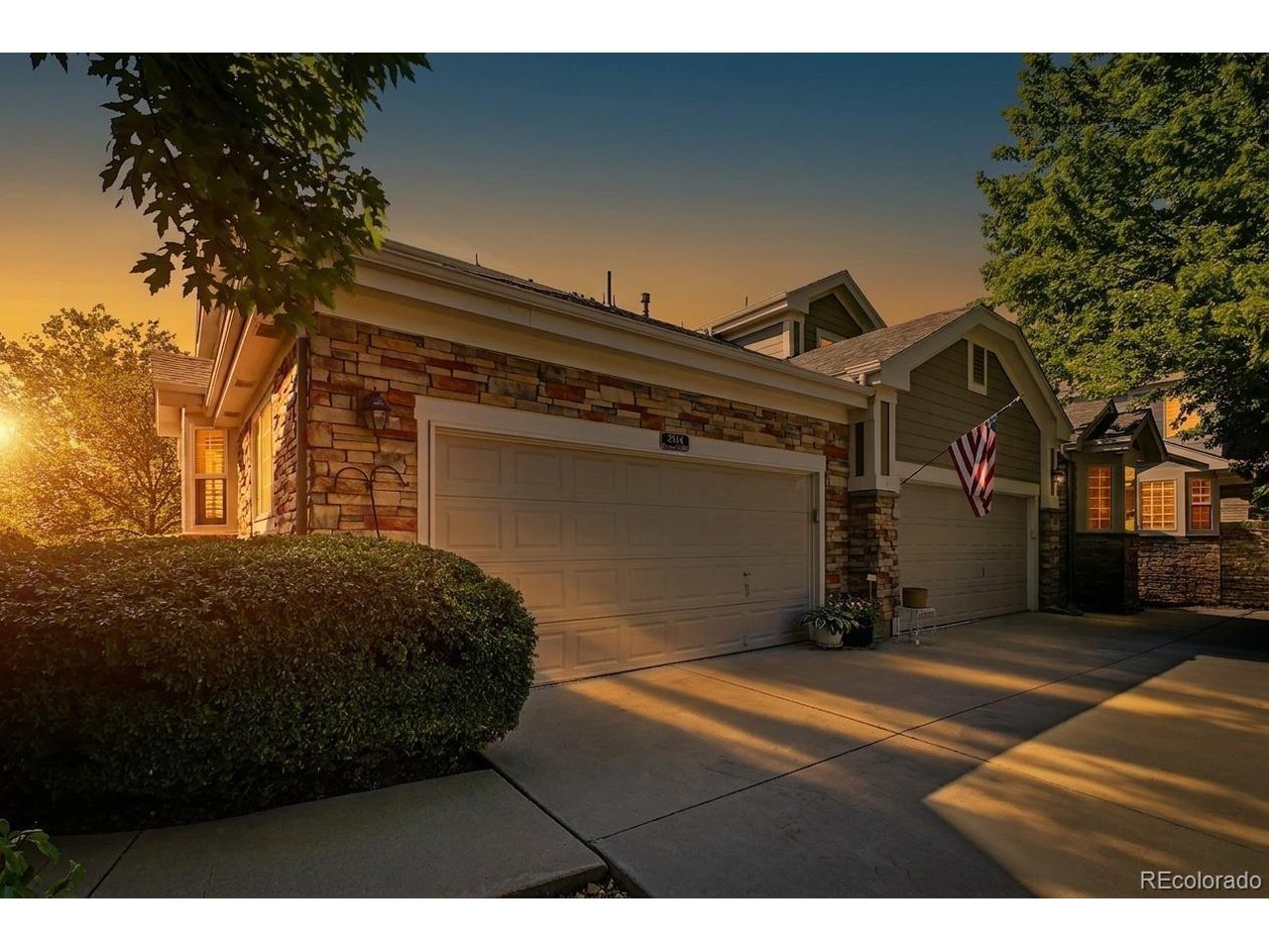 AMAZING NEW PRICE!!**Rare End Unit Backing to Open Space with Lake Views!** Main Floor Primary Bedroom and Living! Opportunities like this don't come along often. Perfectly positioned on a quiet cul-de-sac, this beautifully maintained end-unit offers the privacy, views, and peaceful setting buyers are looking for. Step outside to miles of walking and biking trails, enjoy tranquil lake views, and listen to the sounds of nature from your private patio.Inside, the bright, open floor plan is filled with natural light, soaring vaulted ceilings, rich hardwood floors, and expansive windows that bring the outdoors in. The spacious kitchen offers abundant cabinetry, a large pantry, dedicated desk/workspace, and a sunny breakfast nook-ideal for everyday living and entertaining.The main-floor primary suite is a true retreat featuring a walk-in closet and an updated spa-inspired five-piece bath. Upstairs, the versatile loft with hardwood floors and a large skylight makes the perfect home office, library, or creative studio. A generous second bedroom with two closets and a private full bath provides an ideal guest suite or second primary bedroom.The unfinished basement with bathroom rough-in offers endless possibilities to expand and customize the home to fit your lifestyle.Additional highlights include an oversized two-car garage with exceptional storage, newer A/C, newer roof, fresh paint, and newer concrete.Enjoy resort-style amenities just steps away, including the community fitness center and indoor pool, while Broadlands Golf Course, parks, shopping, restaurants, and major commuter routes are all just minutes away.This is one of the most meticulously cared-for homes in the community, combining low-maintenance living with an unbeatable location, beautiful views, and incredible potential. Don't miss this rare opportunity!