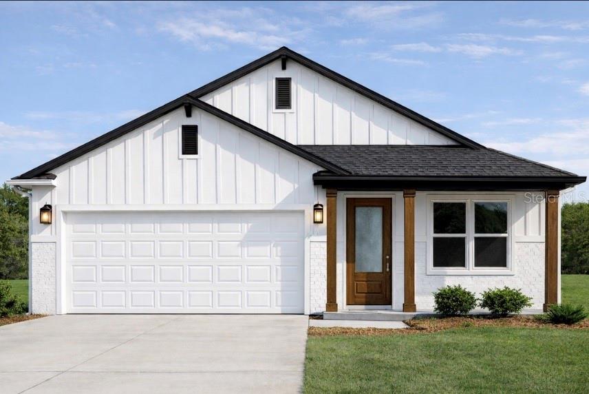 Under Construction. Welcome to this brand-new farmhouse-style residence offering the perfect blend of modern design, quality construction, hurricane impact windows and doors, and a peaceful setting in unincorporated Largo. Situated on a 63' x 128' homesite at the end of a quiet dead-end street, this one-story concrete block home enjoys a unique location directly across from the McKay Creek County Conservation Area, providing a natural wooded backdrop, added privacy, and no homes directly across the street. Best of all, the property is located in Flood Zone X, offering additional peace of mind. Inside, you'll find an inviting open-concept floor plan featuring 3 bedrooms, 2 bathrooms, and a versatile bonus room that can easily serve as a home office, den, playroom, or home gym. The spacious kitchen is designed for everyday living and entertaining, showcasing a large center island with quartz countertops, stainless steel appliances, and seamless flow into the dining and living areas. The private owner's suite offers a spacious walk-in closet and a beautifully appointed en-suite bathroom complete with dual vanities and a walk-in shower. Additional highlights include a walk-in laundry room, covered front and rear porches, and quality finishes throughout. The home is conveniently located near shopping, restaurants, beaches, parks, and major commuting routes while still offering the privacy and charm of a tucked-away neighborhood. Don't miss the opportunity to own this thoughtfully designed new construction home in one of Largo's most unique settings. Schedule your private showing today, and the estimated completion date is September 2026.