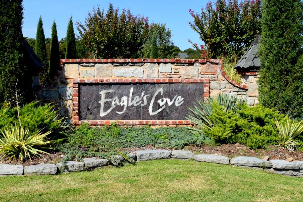 Welcome to the Eagles Cove Addition, an east Edmond development nestled among the trees and backs up to Arcadia Lake. This gated neighborhood is just a few miles from I-35, making commuting and accessibility to shopping in Edmond and North Oklahoma City, extremely convenient. Edmond Schools! The beautifully wooded lot is located at the end of a cul-de-sac.