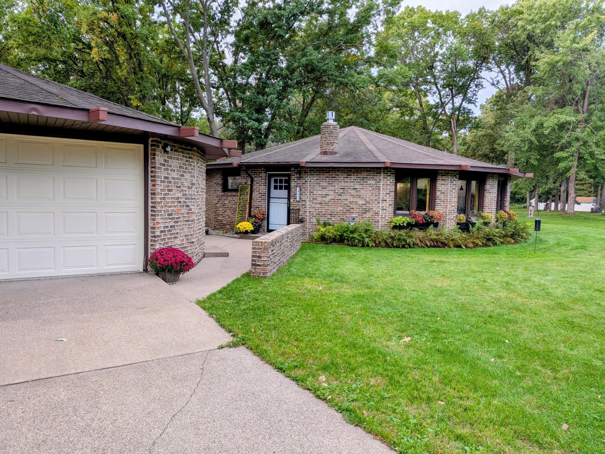 Welcome to this truly one-of-kind 3-bedroom, 2-bath home. Nestled on a large 1 acre lot in the coveted NE Riverwood Drive neighborhood. This slab home is great for those who want a move-in-ready, low-maintenance oasis; in town but with an outskirts of town feel. The beautiful kitchen and main living area has been recently redone and upgraded. Enjoy granite, warm wood beams, a new heating/cool system and a gas fire place. 3 bedrooms and two full bathrooms with no stairs provides you with space and options. The amazing architecture doesn't leave when you walk out the door. The matching oversized 2 stall garage matches the home's unique touch along with the massive circle shaped deck. Every appliance in the home has been updated in the past 5 years including a radon system and a 12' x 16' shed. This home is ready to enjoy!