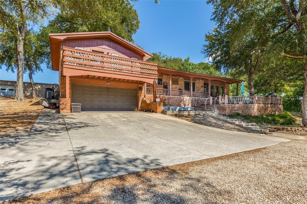 Welcome to your dream home in sought after Lindsay ISD! This stunning 2,549 sqft residence, nestled on a private 1.94 acres of serene land, offers the perfect blend of comfort and luxury. Featuring 3 spacious bedrooms and 3 full bathrooms, this home is designed to cater to all your family’s needs. Step outside to your backyard oasis—a recently redone pool equipped with a thrilling slide, perfect for endless fun and relaxation. The large workshop is a craftsman's delight, providing ample space for projects and storage. Plus, the installed solar panels promise energy efficiency and significant savings on electricity bills. Situated in a beautiful and tranquil setting, yet conveniently close to all necessary amenities, this property is a true sanctuary.  Experience the best of both worlds with this incredible home!