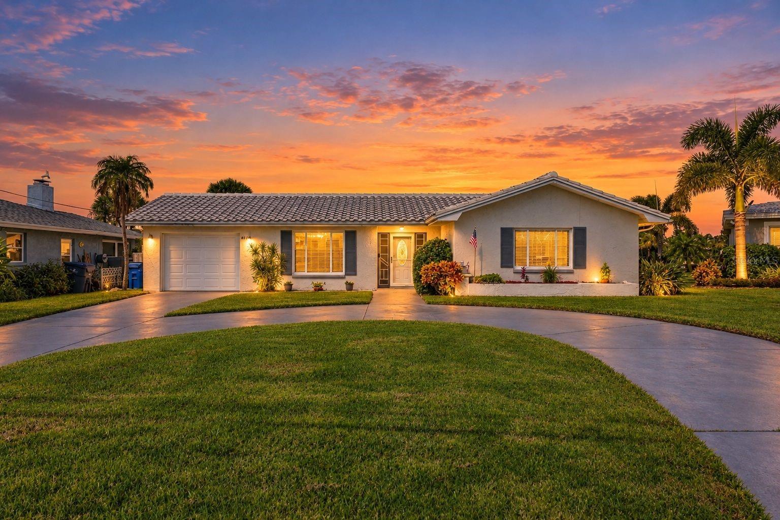 Boater’s Paradise: Deep-Water Gulf Access with Sunrise & Sunset Views. 75 Ft of Waterfront | No Bridges | 2 Minutes to Open Gulf on the Bend at Bowline. Spectacular waterfront masterpiece where big boats are always welcome. Driving down Bowline Bend, a highly coveted cul-de-sac—lined with stunning, multi-story - multi million-dollar new builds— you will see the incredible pride of ownership defining this coastal enclave. From the moment you step through the front door, sweeping, unobstructed water views draw you into a sprawling, sun-drenched open floor plan.  .20-acre lot with 75 feet of prime water frontage, this move-in-ready retreat offers a rare combination of upscale neighborhood prestige, direct bridge-free Gulf access, and a lively, welcoming beach community. Situated on a deep, wide channel just 2 minutes from open Gulf waters  No bridge restrictions mean your large vessel can navigate with ease.  A massive 25x8 ft oversized floating dock comes fully equipped with a dedicated fish-cleaning station for the day's catch. Enjoy a sweeping circular driveway with extensive guest parking and meticulously maintained landscaping, complete with fruiting Meyer lemon and fig trees. A dedicated 10x10 shop off the garage stores all your fishing tackle and boating gear, while the backyard layout leaves plenty of room for a pool. Designed for effortless entertaining and comfortable coastal living, the home boasts a grand layout anchored by high-end Italian porcelain tile flooring and premium granite & quarts countertops throughout.  Featuring 2  living areas and 2  dining areas, allowing for seamless hosting and flexible everyday living.  A large enclosed Florida room offering incredible water and sunset views with a kitchen pass-through window. Updates include new cabinetry and Samsung stainless steel appliance package.  The primary retreat offers an elegant ensuite bath and two custom modern luxury closets. The impressive, oversized guest bath features an updated double-sink vanity. ALL closets throughout the home have been reimagined with modern luxury custom designs. This home offers unparalleled Florida lifestyle that goes far beyond the property line:Walking distance to the community’s private beach, a hub for year-round activities, live concerts, festivals, and neighborly gatherings.A short walk brings you to the neighborhood park, where regular social events bring the neighborhood together for shared meals, community functions, and dog walking. A community boat ramp sits right on Bowline for quick and easy loading.  Ultimate Peace of Mind HVAC = High-efficiency 3.5-ton Lennox system with a 10-year warranty. Plumbing & Sewer: Completely updated plumbing throughout, including updated sewer lines and a new hot water heater. Whole-house filtration and water softening system.  Clay tile roof (2005) with many years remaining. Updated: electrical panel, double-pane windows, and new interior doors.  Freshly painted interior and exterior with updated bathroom vanities with Quartz countertops  and new kitchen cabinetry with fine granite counters.  Coastal boaters paradise awaits you.  Nothing to do here, just move right in!  Look at the aerial photos to appreciate the "impressive & RARE waterfront location"  this property offers.  Current owner is the 2nd owner and has enjoyed the Bend on Bowline for over 30 years. Watch manatee, dolphin & variety of Gulf Shore birds here!  Tour this one today before it SAILS AWAY !