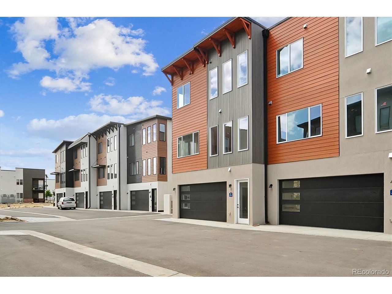 6450 Cleora Road, Unit H offers one of the best values in Salida for new construction, with no sacrifices in design, build quality, or finish level. This desirable end unit features some of the best mountain views in the development and is the final unit available for sale at Confluent Condominiums.The thoughtfully designed home offers three primary suites, each with an en suite bathroom. The accessible lower-level suite includes a finished kitchenette, separate entrance, and lock-off potential, making it ideal for rental income, guests, multigenerational living, or other flexible use. Two additional primary suites are located upstairs.Additional highlights include 10-foot ceilings on the main level, 9-foot ceilings upstairs and downstairs, large windows throughout, decks on every level, a fireplace, a spacious kitchen with generous storage, and a large attached two-car garage. Enjoy East Side river access in the Confluent neighborhood, direct connection to the City Trail system, and a new city park across the street. A builder warranty is included for one year from closing.This is the last opportunity to own a new home at Confluent-don't miss your chance to secure the end unit with the best views. Come see it before it's gone!