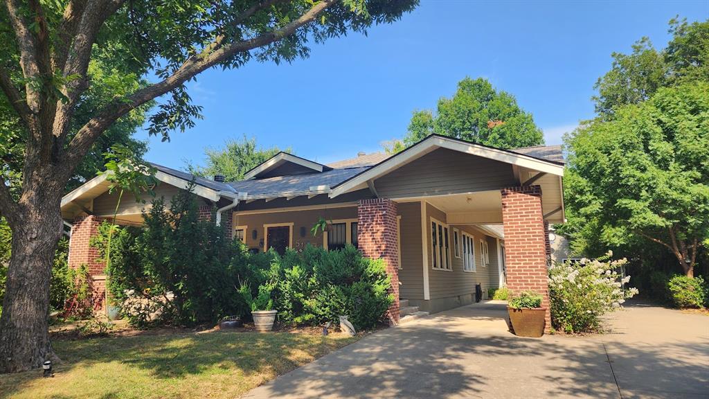 Welcome to Norman, Oklahoma! This charming home blends classic character with thoughtful modern updates in a convenient location near the University of Oklahoma and Lions Park. Inside, beautiful wood, ceramic and slate tile flooring complement built-in bookshelves, a cozy fireplace with new gas logs and auto-light installed in 2025, ceiling fans, two spacious living areas and two dining areas. A versatile bonus room provides the perfect space for a home office, study or additional living area.The updated kitchen features quartz countertops, subway tile, center island, pantry, gas range, built-in microwave, refrigerator and a new dishwasher installed in 2025.Step outside and discover a fenced backyard with a peaceful, park-like setting and charming English garden.  Garden beds offer space for homegrown vegetables, while the gas grill and relaxing hot tub make the backyard a wonderful place to unwind or entertain. A detached two-car garage provides additional convenience.Numerous improvements add to the home's appeal, including new central heat and air and water heater in 2022; new roof, gutters and north-side windows in 2023; and new fireplace gas logs with auto-light and dishwasher in 2025.Conveniently located near OU, parks, shopping, dining and more, this home offers a wonderful combination of character, updates and exceptional outdoor space. Schedule your showing today and discover all this Norman home has to offer!