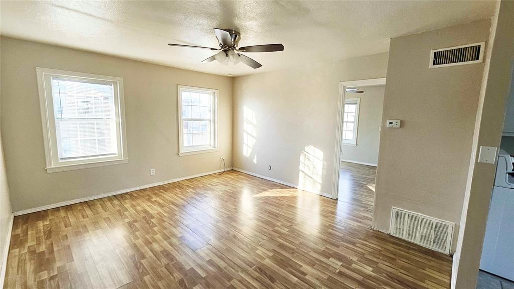 Bright and inviting 1 bedroom / 1 bathroom apartment located on the second floor. The home features a spacious living room with excellent natural light and a neutral color palette that works with any style. The kitchen includes a refrigerator and microwave for convenience. The bedroom is generously sized with ample space for furniture and storage. The property is gated, offering added privacy and peace of mind. A great option for comfortable, low-maintenance living. Schedule your private showing today!