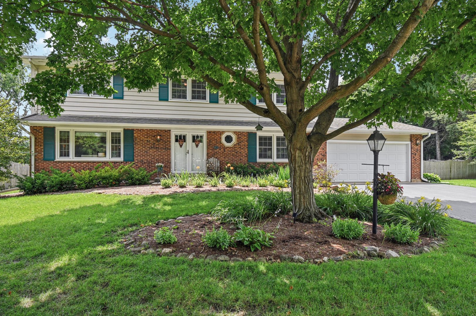 RELOCATION SIGNATURE PENDING - OFFER VERBALLY ACCEPTED!.  Like-New in Crystal Lake Estates! This 4 bed, 2.1 bath home on a 1/2acre lot offers nearly 3,100 sq ft of updated living space plus a finished basement and fenced yard. This is a relocation for sellers.  So your gain,  135K+ in improvements since 2021-this home lives like new construction without the wait and cost!    Step inside to a sun-filled main level with hardwood floors, an open kitchen (2023 resurfaced cabinetry, new oven & dishwasher), a dining room with woodburning fireplace, and a dramatic large family room with a second fireplace. Enjoy year-round views from the airy 3-seasons room or head outside to your 2023 backyard transformation: new concrete patio, Andersen slider, firepit area, buried downspouts, and fresh landscaping with young trees.    Upstairs, four spacious bedrooms include a luxuriously renovated primary suite (2021) with dual sinks, walk-in shower, soaking tub, and custom closet. Finished basement (2023) adds a rec/gym space with new flooring, can lighting, utility sink, and drywall ceilings.    Major updates for peace of mind: 2024 high-efficiency furnace, A/C, water heater, PVC main drain, whole house filter, sump pump; chimneys rebuilt/sealed (2022 & 2024); crawl space reinforced and spray insulated; garage drywalled/insulated and lit (2021). Whole house interior paint in 2022.    Unincorporated Crystal Lake = lower taxes plus private well and 2024serviced septic for reduced utility costs. Close to Pingree Rd Metra, Routes 14 & 31, Main Beach, shopping, and dining.    Move in and enjoy years of worry free living-4909 Daniel Drive is a rare find in Crystal Lake Estates!