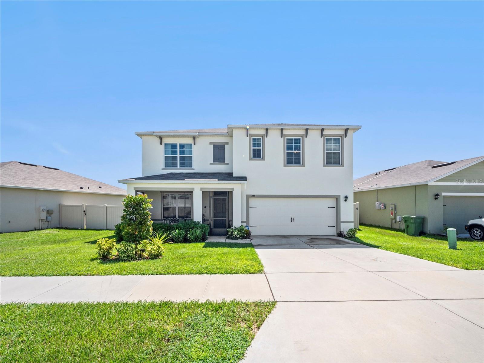 Investors Only.  Leased through August 31, 2027, at $2,575/month.  Landlord provides lawn care.  No rear neighbors and entirely fenced for privacy! Low HOA dues and bonus room/loft plus office space. Open concept with luxury laminate flooring throughout including stairs.  Full-sized kitchen island with seating and plenty of counter space for food prep.  Stainless steel appliances.  The dining and family room combo offers plenty of natural lighting with slider glass doors leading to your outdoor patio overlooking the conservation area. The master bathroom features two (2) walk-in closets. Enjoy the early morning sunrises sitting under your custom-built pergola in back. Screened front porch. Located 6 miles from Legoland Theme Park and Water Park.