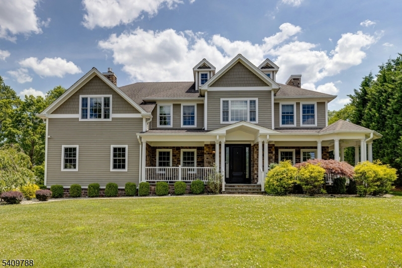 This elegant home is situated on Westfield's North side, in the Wilson Elementary School district, in a quiet picturesque suburban neighborhood, offering a luxurious lifestyle with easy access to Westfield's downtown shops, restaurants, train, and parks, and great commuting options into NYC. The expansive layout offers functionality for both daily living and entertaining, ample space for guests, and privacy within the home. The home sits on .44 acres with a fully fenced backyard. This luxurious home offers modern conveniences and functionalities that are coupled with exquisite details and a thoughtful layout that will serve well for the most discerning buyers. The 1st floor guest suite is private and tucked away from the main hub of the home. Upstairs, the primary suite is sizable, with dual walk in closets, a sitting room, a double sided fireplace, and a substantially sized primary bathroom. There are also 3 additional bedrooms, 2 more full baths, and a large laundry room on the 2nd floor. The 3rd level boasts an oversized 6th bedroom great for additional guest space, home office, or bonus rec space. The lower level is simply incredible: exposed brick, a full wet bar, a bonus room with attached full bathroom, a home gym, high ceilings, and great rec space. The whole house generator adds to the luxurious, modern conveniences. The backyard is expansive and private.