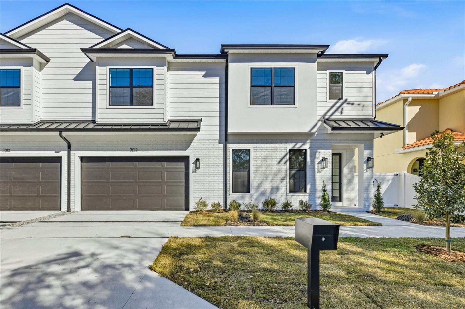 Move-in ready! Discover the perfect blend of modern convenience and timeless design in this stunning new construction, two-story duplex. This unit is the right side of the building. With 4 bedrooms and 3.5 baths, this home offers an abundance of space and thoughtful layout. The first floor welcomes you into a spacious living room that seamlessly flows into the dining area and gourmet kitchen, featuring an island and generous pantry for all your culinary needs. A versatile study, accessible from the mudroom, provides an ideal work-from-home space, while the covered porch just off the kitchen creates the perfect spot for outdoor relaxation.Upstairs, retreat to the luxurious primary suite complete with his and hers walk-in closets and a large en suite bath designed for ultimate comfort. Two additional bedrooms, each with walk-in closets, share a well-appointed bathroom, offering plenty of room and privacy. The guest suite, with its own en suite bath, is perfect for visitors or extended family. A conveniently located laundry room on the second floor adds to the ease of living in this beautifully crafted home. This townhome embodies both style and function, creating a welcoming haven for all. Located in an A rated school district and no flood insurance required. No HOA fees.