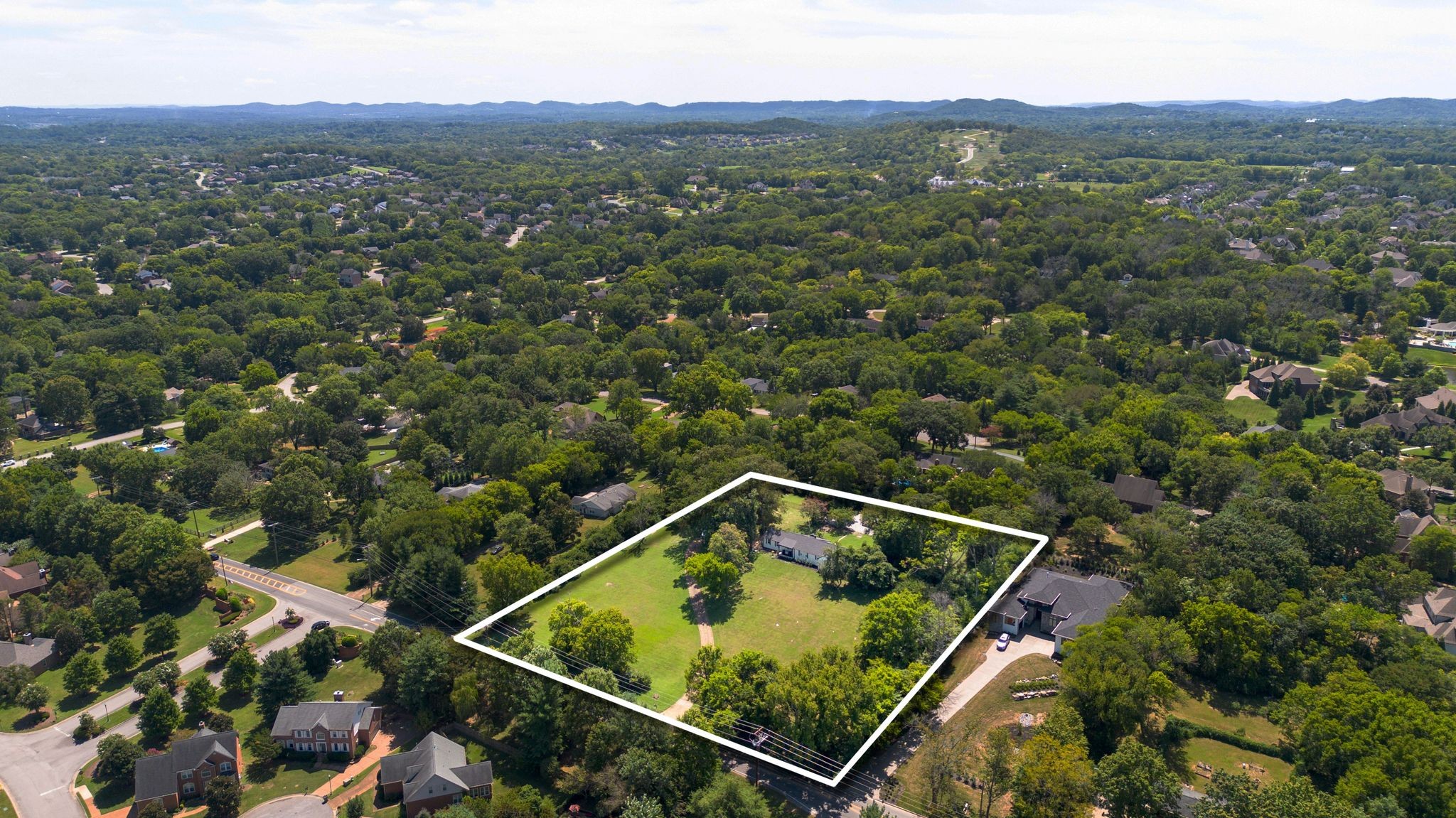 RARE Opportunity! 3 acres available near the prestigious Brentwood area of South Nashville. Minutes from interstate 65,this property gives you quick access to anywhere in the city. Currently the property hosts its original 1950s  ranch house in the perfect spot to rebuild a magnificent dream home on one of the last largest parcels in the area. Alternately, the 3 acres has been pre-approved to support splitting into (3) 1-acre lots that support (2) houses per lot under its current zoning R-40 yielding (6) homes total. This  property is the last of its kind in the area.