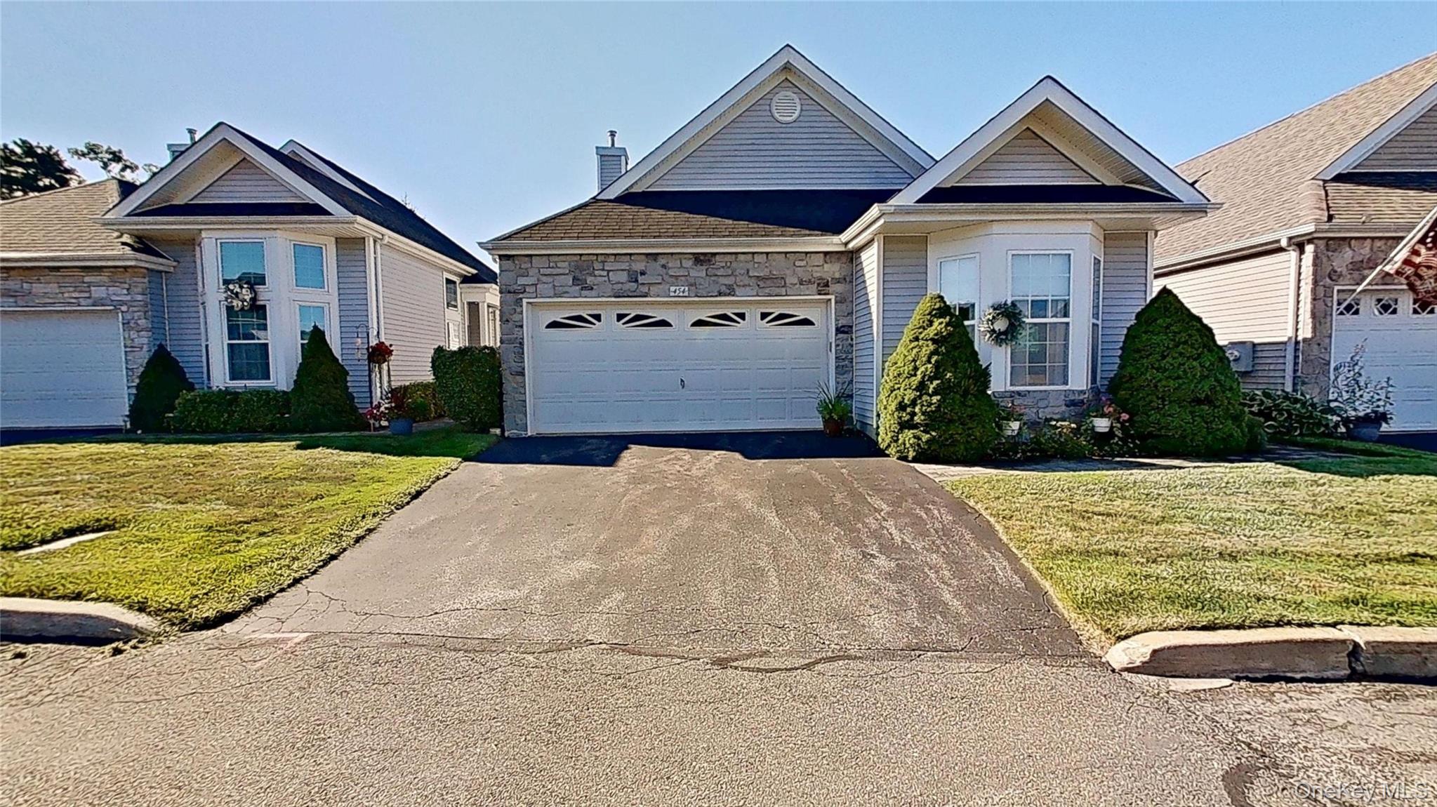 Welcome to this spacious home with a welcoming open floor plan!  The Leisure Glen community and this free-standing Maidstone model offer desirable features and are conveniently located near highways and all that Long Island has to offer!  Features include: a 3-year-old roof+-, an alarm system, a kitchen garbage disposal, a pantry, custom kitchen & cabinet drawers, crown molding, hi-hats, blinds, 4 ceiling fans, closet organizer systems, lots of closets and storage space, a gas hot-water heater, plus an electric fireplace.  9 ft ceilings in the many rooms plus 11ft ceilings in the great room areas!  The community amenities include a fitness center, BIG pool w/ Lifeguard, tennis, pickleball, bocce, shuffleboard, walking paths, and many community activities! Plus a CHOICE 12-month Home Warranty included with this purchase! Take a 360-degree VIRTUAL TOUR by clicking the following link:  https://my.matterport.com/show/?m=miNTa3oh59M. See it today and call it yours tomorrow!
