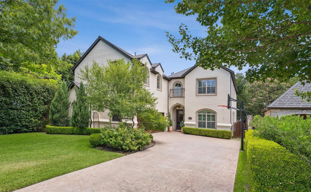 *Motivated Seller, *Seller offering $7500 seller concession at closing with an acceptable offer by September 30th*. Welcome to 2917 Westridge Avenue, a stunning two-story residence in the heart of Ridglea, blending classic architecture with modern comforts in one of Fort Worth’s most coveted neighborhoods. This thoughtfully designed home offers 4 bedrooms, 3.1 bathrooms, and over 4,300 square feet of living space, providing an ideal balance of functionality and luxury.

Step inside to a grand two-story foyer with an elegant sweeping staircase, hardwood floors, and abundant natural light. The open layout seamlessly connects the formal dining room, spacious living room with fireplace, and a chef’s kitchen featuring granite countertops, custom cabinetry, stainless steel appliances, double ovens, and a generous island—perfect for both entertaining and everyday living.

The primary suite on the main floor offers a peaceful retreat with a spa-like bathroom, complete with a soaking tub, glass-enclosed shower, dual vanities, and a large walk-in closet. Upstairs, you’ll find additional bedrooms, an office, and a family room with built-in cabinetry and a wet bar, adding flexibility for work or play.

Step outside to enjoy serene moments on the covered patio with a charming porch swing. The outdoor fireplace creates an inviting ambiance for gatherings, and the fenced backyard offers both privacy and green space for pets or play.

This home is filled with thoughtful touches, including plantation shutters, designer lighting, ample storage, a laundry room with a sink and built-in cabinetry, and an oversized 2-car garage.

Located in Ridglea—just minutes from Fort Worth’s cultural district, shopping, and dining—2917 Westridge Avenue offers a rare blend of elegance, comfort, and convenience.