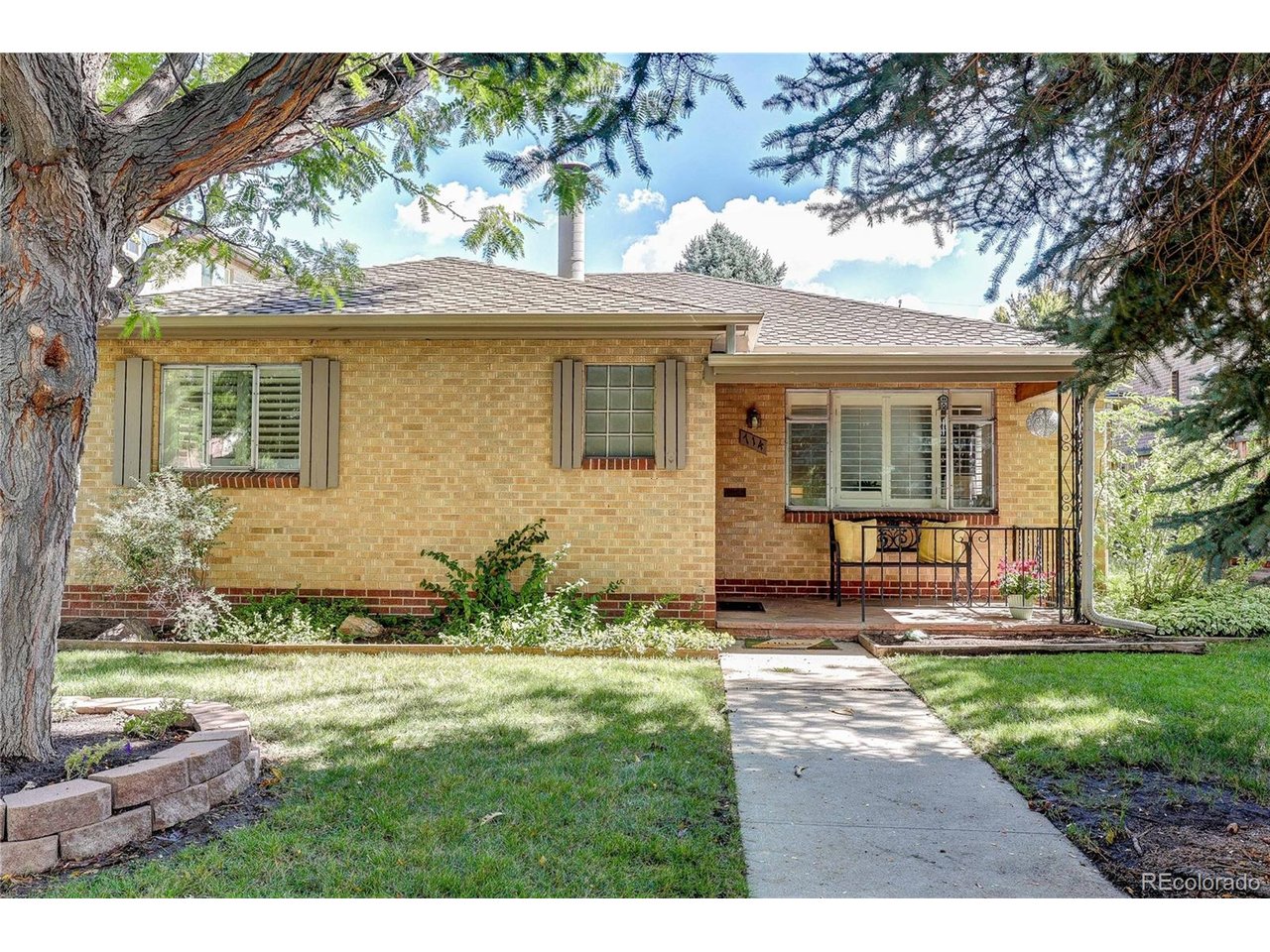 What are THE keys to residential real estate? LOCATION, LOCATION, LOCATION!First time on market in almost 50 years....prime redevelopment site;Charming mid-century ranch house offering one level living with cove ceilings, gleaming wood floors, porthole window, built-ins, fireplace, 2 generous bedrooms and 2 baths, a Full and a 3/4,  along with updated kitchen!Lush landscaping, mature trees and sprinklered private yard with a covered back patio! This is the ideal alternative to the in-town condominium or town home and NO HOA dues; the perfect way to downsize while living in one of Denver's most coveted neighborhoods.....Bonnie Brae; The block and neighborhood feature many multi-million dollar homes....