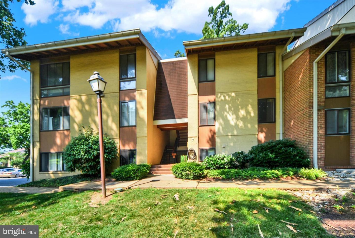 Two-bedroom, two-full-bath condo in the gated Village of Cross Keys in Roland Park! This second-floor unit has parquet wood floors, big windows with tree views, and an open kitchen with granite counters, a breakfast bar and stainless appliances. Sliding doors lead from the dining area to a private balcony. The primary suite has its own bath with a walk-in shower. A dedicated carport space conveys.Cross Keys is a private, wooded community with an outdoor pool, tennis courts and walking paths, all behind a security gatehouse. You can walk to the Village Square for its shops and restaurants, and the Cross Keys Inn is right there for visiting guests. Quick access to I-83, Northern Parkway and downtown. 12-month minimum lease. No pets. No smoking.