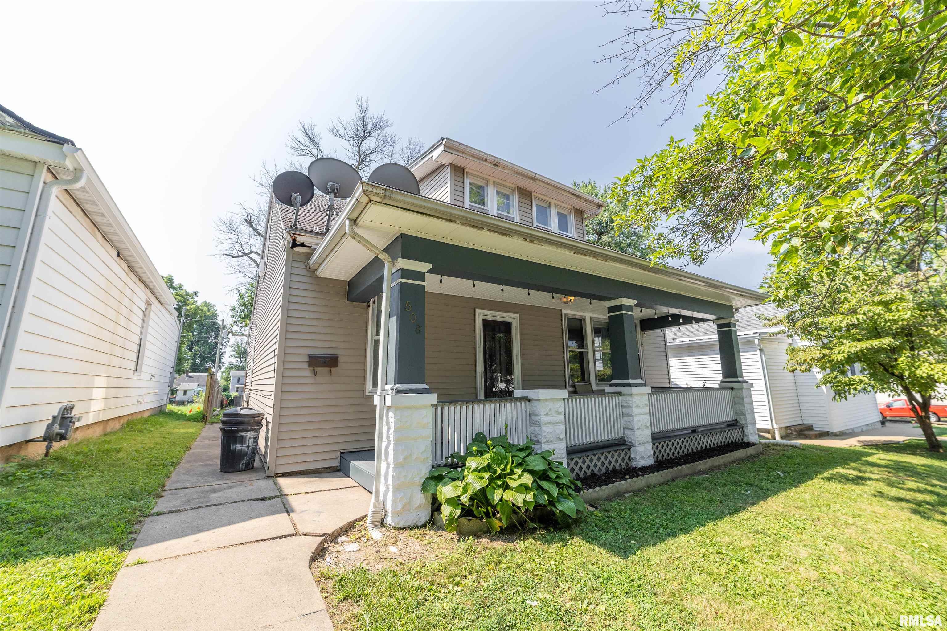 Opportunity awaits with this 2-bedroom bungalow offering plenty of potential to build equity! A non-conforming walk-through room provides the flexibility for a home office, playroom, or possible third bedroom. Original hardwood floors are believed to be hidden beneath the carpet, just waiting to be uncovered. Outside, you'll find a fenced backyard and a metal shed/outbuilding for additional storage. This fixer-upper is the perfect chance for an investor, flipper, or buyer ready to roll up their sleeves and make it their own. With vision and a little sweat equity, this home could truly shine!