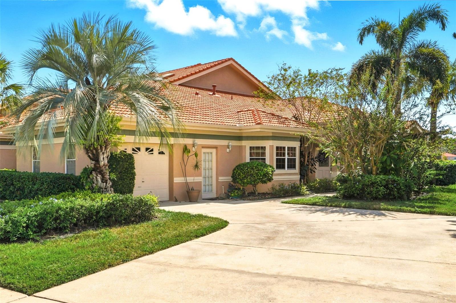 Experience the best of Florida living in this beautifully maintained waterfront end unit townhome located in gated Waterview . Enjoy breathtaking waterfront views from your screened lanai, perfect for morning coffee or evening relaxation. Step inside to an open floor plan that seamlessly blends the living, dining, and kitchen areas—ideal for both entertaining and everyday comfort. The home offers maintenance-free living, allowing you to spend more time enjoying the community’s resort-style amenities, including a sparkling pool and tennis courts. Nestled just minutes from Ritz Carlton, Seaworld, shopping, and exquisite dining options, this home combines luxury, convenience, and tranquility in one perfect package. You're home!