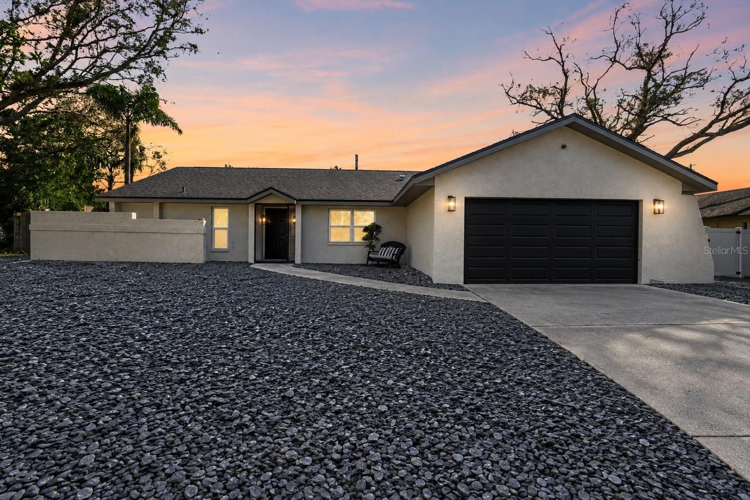 Welcome to your own slice of Florida living in beautiful Palm Harbor! This move-in-ready 3-bedroom, 2-bathroom split floor plan, plus a BONUS ROOM offers the perfect blend of comfort, style, and entertaining space. Featuring a desirable split floor plan, the home provides added privacy while creating an inviting flow for everyday living and hosting family and friends. A versatile bonus room makes the perfect home office, flex space, or hobby room.Enjoy the best of Florida living outdoors with an expansive covered and screened-in patio that seamlessly extends your heated pool and entertaining space. The newly refinished PebbleTec pool, the perfect place to soak up the Florida sunshine, enjoy a refreshing swim, or unwind with family and friends in your own private backyard retreat.Inside, the spacious owner’s suite offers a resort-inspired escape, complete with a large soaking tub and steam shower for the ultimate at-home spa experience. You’ll appreciate the many upgrades throughout, including a NEW ROOF, NEW AC, NEW DUCTWORK, PebbleTec pool resurfacing, NEW POOL PUMP, NEW POOL HEATER and so much more!Even better, the tasteful, designer-inspired furnishings are included in the sale price, making this home truly turnkey and ready for you to move right in. Whether you’re looking for your forever home, a stylish Florida getaway, or a beautifully furnished property ready to enjoy from day one, this Palm Harbor gem checks all the boxes. Simply bring your bags and start enjoying the Florida lifestyle!