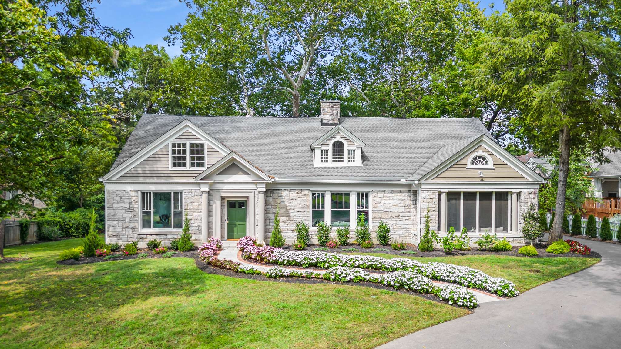 Welcome to 931 Caldwell Lane, a home that blends classic charm with modern comfort. From the locally sourced stone used on the exterior to the carefully restored hardwood trim by a Nashville craftsman, every detail was chosen with care. Inside, you’ll find 11-foot ceilings, quality finishes, and a spacious kitchen built for everyday cooking or entertaining, complete with a walk-in butler’s pantry. The primary bedroom opens onto a screened-in porch, offering a quiet spot to relax.The home also includes a smart security and tech system, plus an automated irrigation system to keep things simple.