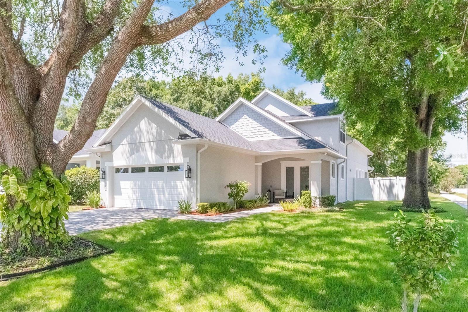 Modern Comfort & Style in the Heart of SODO – Built in 2020!
Nestled on a shady corner lot, this beautifully maintained 3-bedroom, 2.5-bathroom home offers 2,576 heated square feet of thoughtfully designed living space in one of Orlando’s most desirable neighborhoods. Built in 2020, this two-story traditional-style residence blends charm and function with an open layout perfect for everyday living and entertaining.

Step into a welcoming dedicated dining room just off the entry—ideal for hosting guests or family dinners. The open-concept kitchen features quartz countertops, stainless steel appliances, 42-inch upper cabinets, and plenty of storage, all flowing effortlessly into the spacious living area and covered lanai beyond.

The primary suite is located on the first floor, just off the living room, offering privacy and convenience. It boasts a spa-like bathroom with an oversized walk-in shower, double vanities, and a custom walk-in closet designed by Inspired Closets, maximizing both space and organization.

Upstairs, you'll find two generously sized bedrooms, a versatile loft area, and a full bathroom featuring a tub/shower combo with ample space and natural light. Additional features include a downstairs laundry room, an attached two-car garage, and recently added gutter guards for low-maintenance living.

Situated in the heart of SODO, you're just minutes from premier shopping, dining, and major commuter routes. Zoned for highly rated Pershing K-8 and Boone High School, this 2020-built gem is ready to welcome you home.

Schedule your private tour today and experience all this beautiful home has to offer!