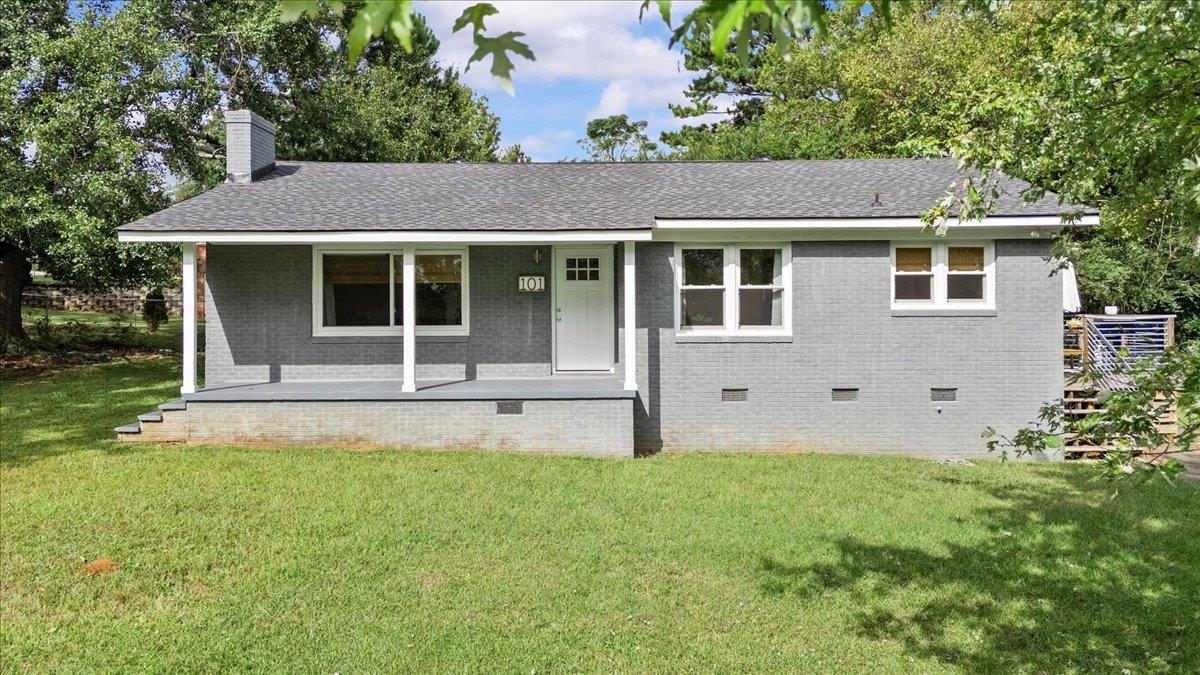 Completely renovated in 2020, this beautiful 3 bedroom, 2 bath home offers modern style, comfort, and convenience-all in the heart of Inman! Step inside to find an inviting open-concept layout filled with natural light. The living room flows seamlessly into the modern kitchen featuring stainless steel appliances, large island, and ample cabinet space. Other features include beautiful hardwood floors in living areas and bedrooms, ceramic tile in bathrooms, covered front porch, deck, and much more! Nestled on a spacious corner lot just minutes from local dining, schools, interstates, and more. Fully renovated, beautifully maintained and ready for you to call home!