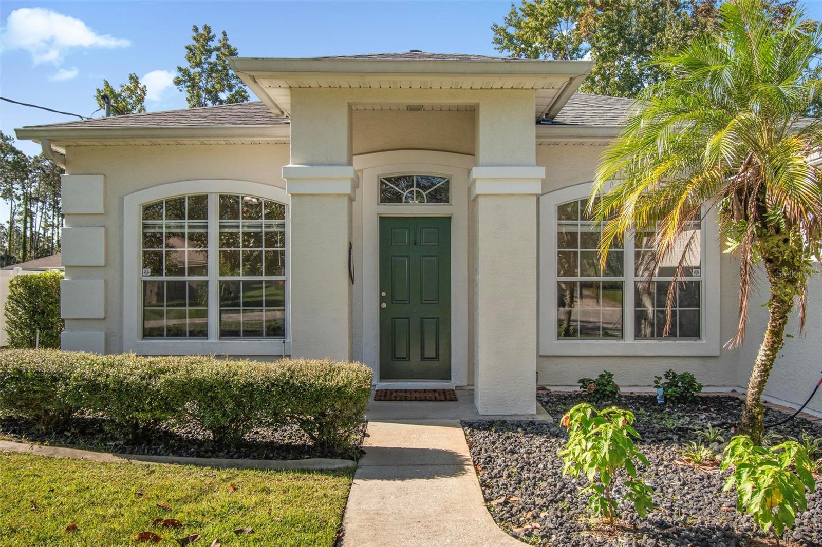 If you are dreaming of the Florida lifestyle near shopping, beaches, parks and golf courses, this home checks all the boxes!
This spacious 4 bedroom home ideal for families or guests with outdoor screened-in pool and island seating and ample storage space. 
Your outdoor oasis is ideal for lounging or entertaining with landscaped backyard.
Whole house is tiled except for bedrooms, Kitchen and Bathrooms granite countertops. Ample space in kitchen for eat in. Separate formal dining room and living room. Great room comes with wood-buring fireplace and built-in surround sound with french doors leading to pool area. Installed alarm system, gutters, irrigation system (well) fans in all rooms, window treatments and ample storage shed in backyard.