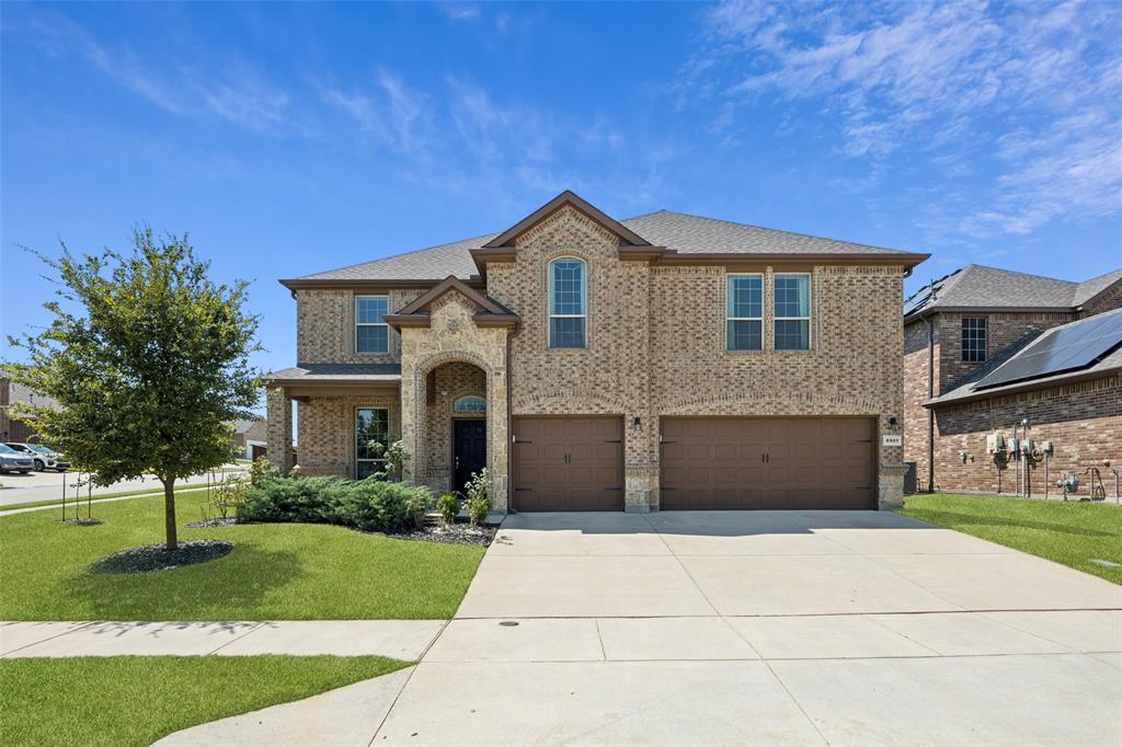 Exceptionally maintained and beautifully appointed, this two-story brick and stone home sits on a large landscaped lot with a stunning park-like backyard. Inside, you’ll find thoughtful updates, modern finishes, and a flexible layout designed for comfort and entertaining. The main level features two full bedrooms and bathrooms, including a secondary primary suite—perfect for guests or multi-generational living. The entryway, kitchen, dining area, and bathrooms showcase stylish wood-look tile, while the upgraded subway tile backsplash and fresh interior paint add a crisp, modern touch. The heart of the home centers around the spacious kitchen and dining area, flowing effortlessly into the inviting living spaces. High vaulted ceilings in all bedrooms enhance the open, airy feel throughout. Upstairs, enjoy endless possibilities with an enormous flex room and a dedicated movie media room complete with stadium seating, projector, and surround sound. You will appreciate the fully landscaped backyard featuring mature pear and peach trees, raised garden beds, and lush greenery that creates a peaceful, park-like setting. Additional highlights include two water heaters, a large 3-car garage, and timeless brick-and-stone curb appeal. This home truly combines thoughtful design, modern upgrades, and exceptional outdoor living in one perfect package. Great community amenities include a community pool and splash pad just one block away! Don't miss out on this gem! 3D tour available online.